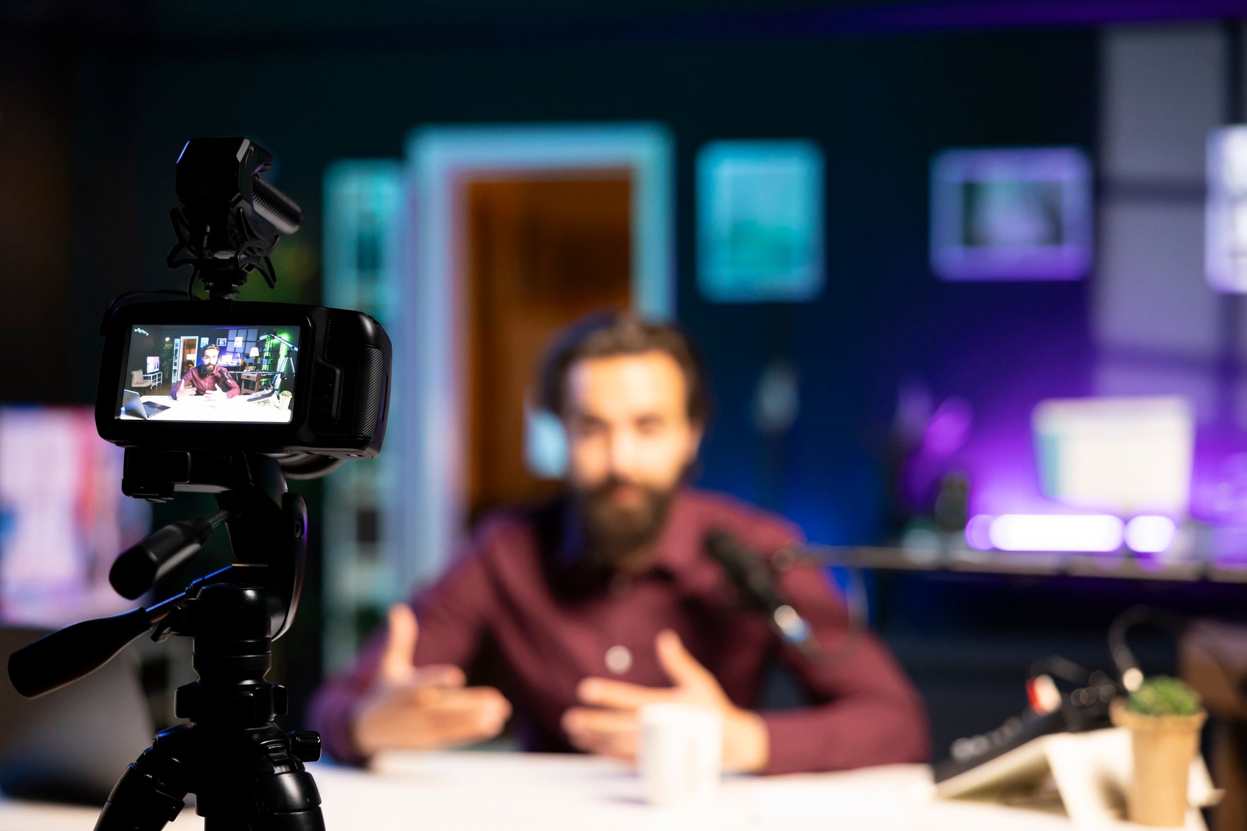 Close up camera used by man recording video