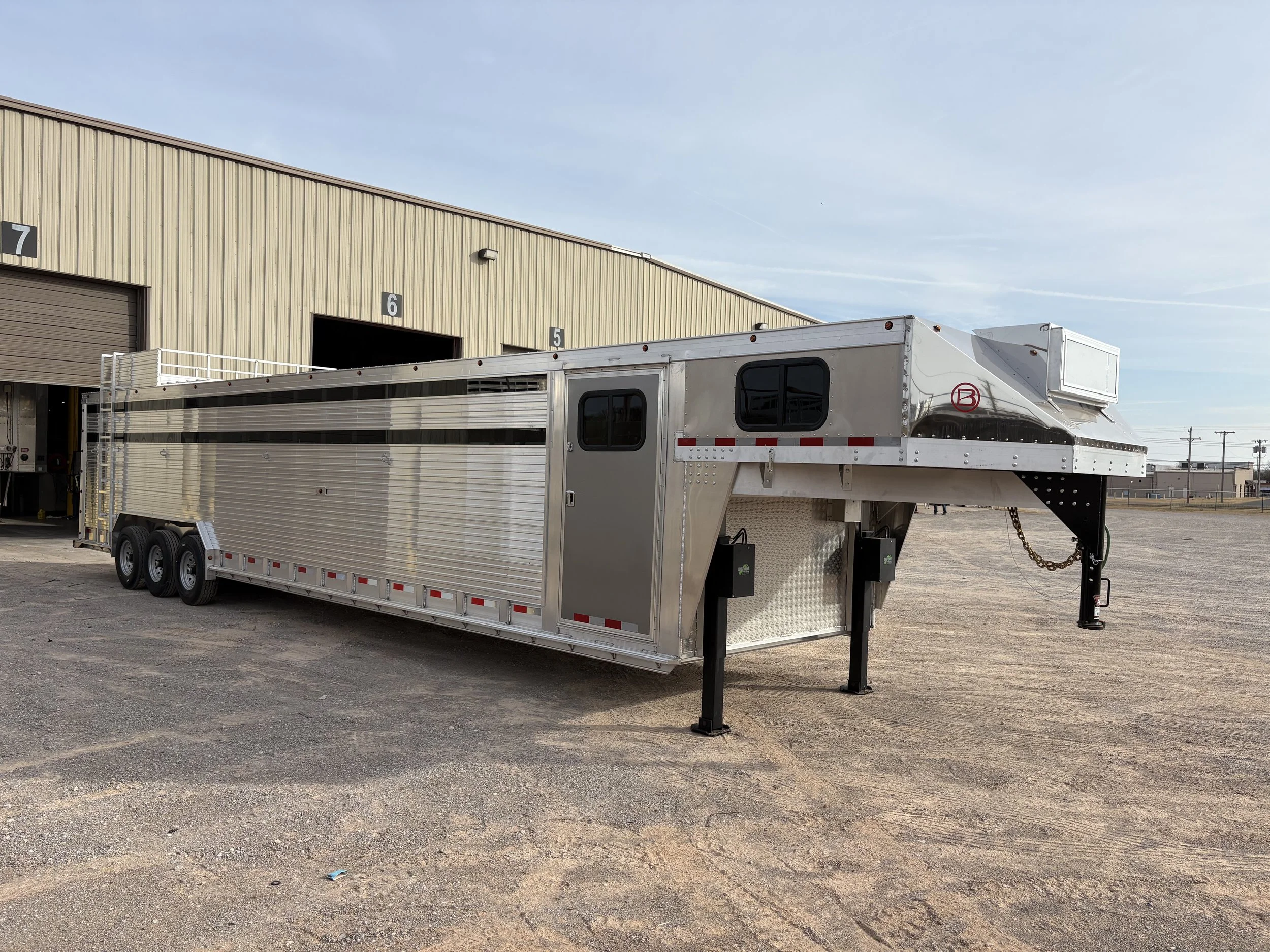 Long Barrett gooseneck cattle trailer designed for safe and efficient cattle transport