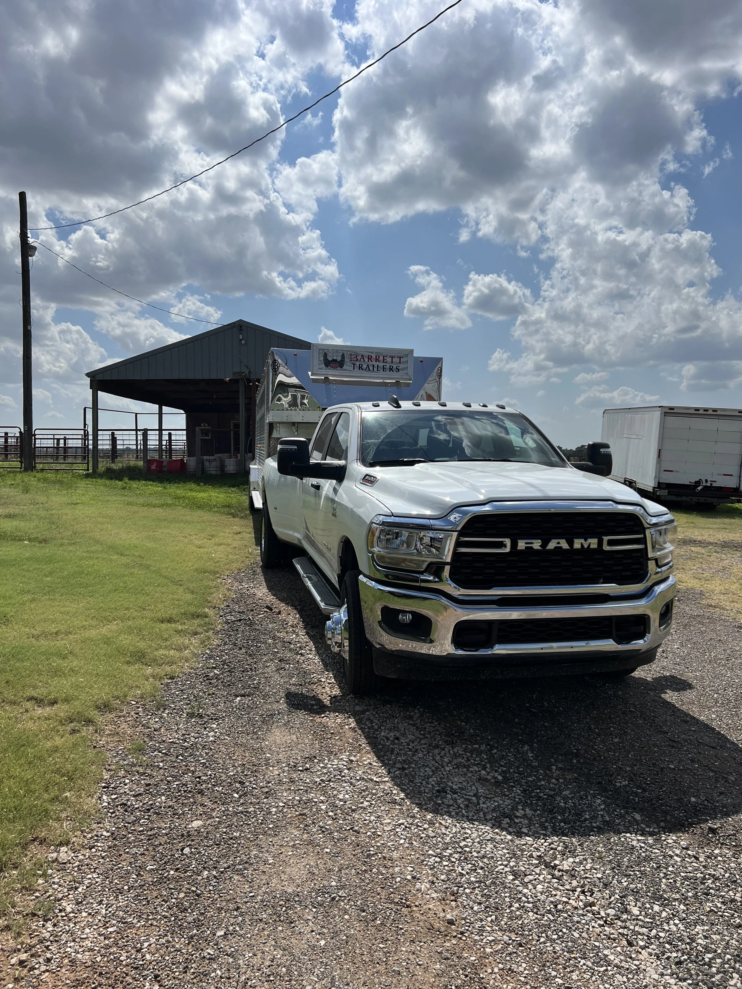 Barrett gooseneck cattle trailer connected to a pickup truck on an Oklahoma ranch