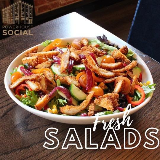 Have you tried our Crispy Chicken Salad yet? This blend of delicious ingredients, featuring locally sourced greens from Thirsty Roots Farm, makes for a light and healthy meal! 🥗🌱 #PowerhouseSocial #PowerhouseonBroadway #Scottsbluff #Nebraska #Nebra
