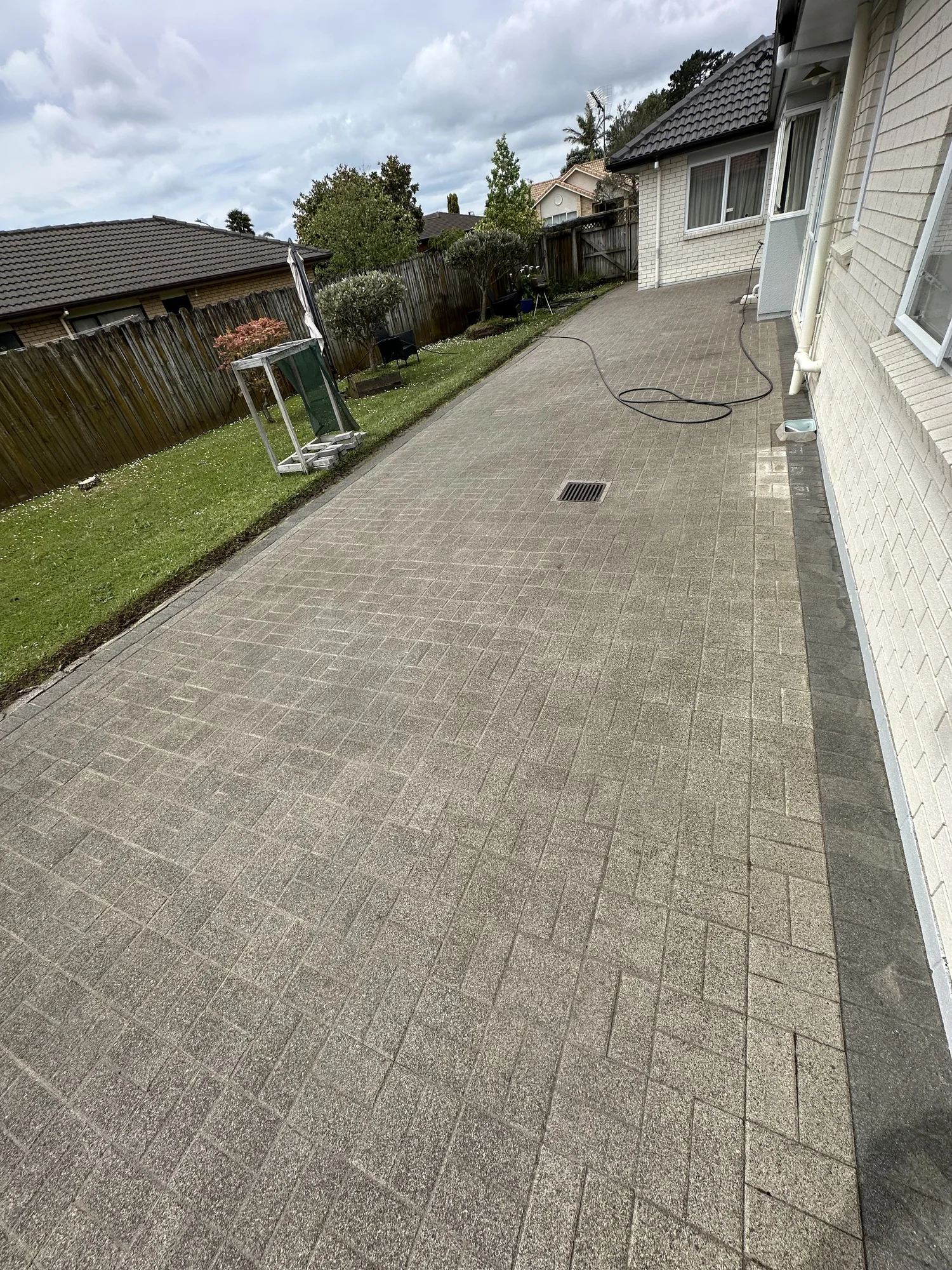 Finished paving after weed removal cleaning and joint restoration
in Golflands East Auckland