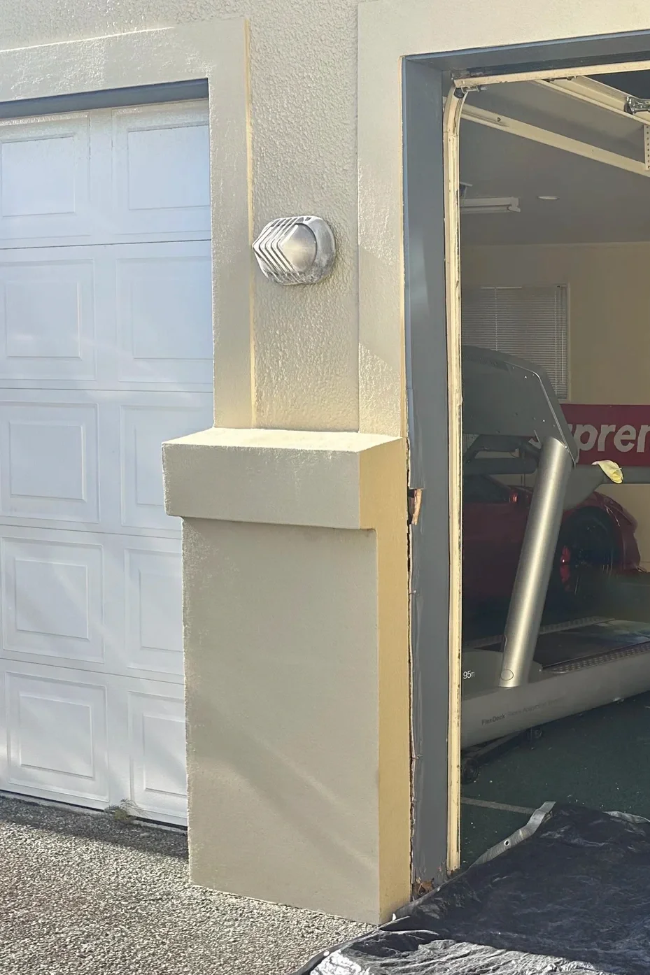 Rotten garage door jamb before repair at a Somerville home in East Auckland