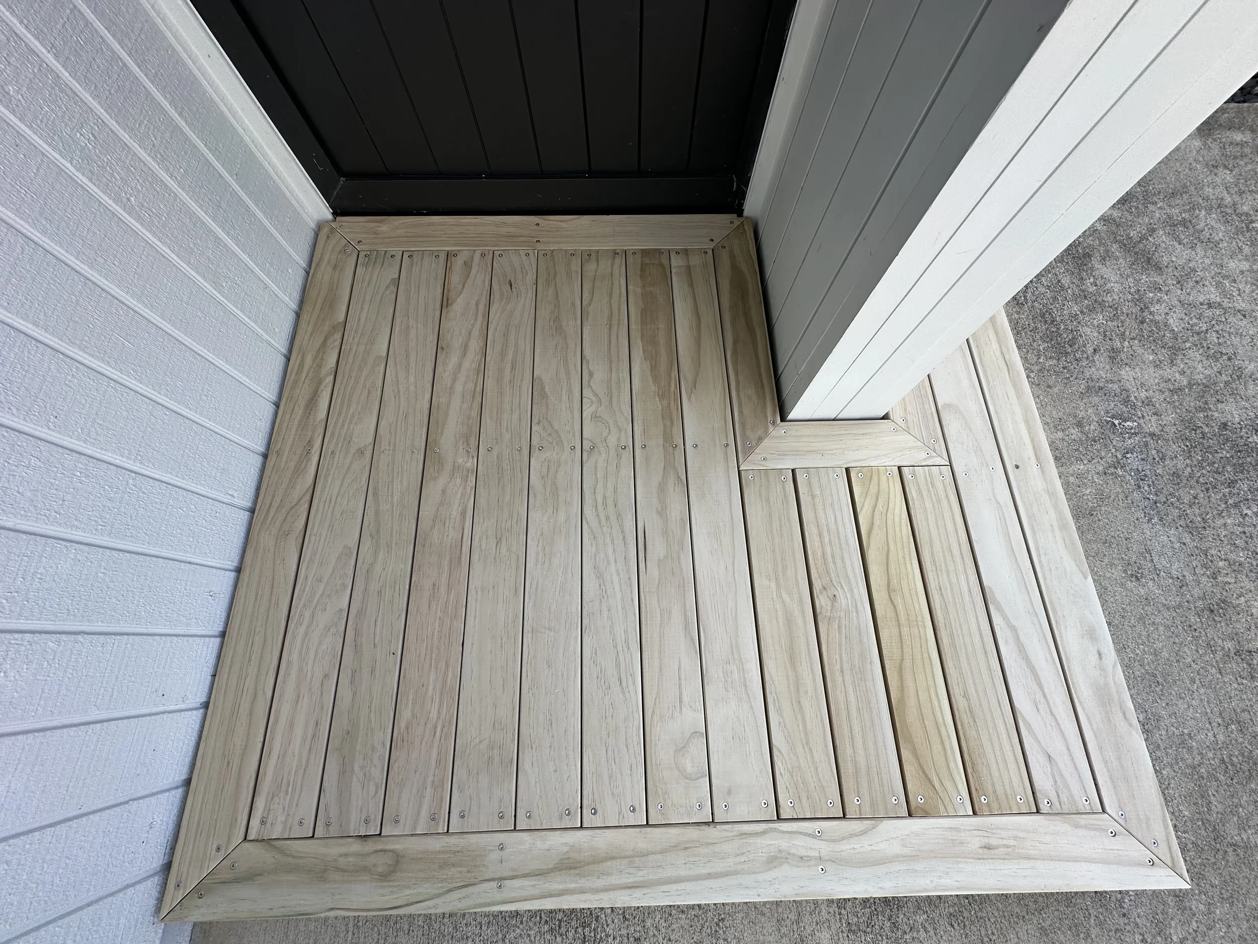 Finished entry decking viewed from above at a home in Cockle Bay, completed in February 2026