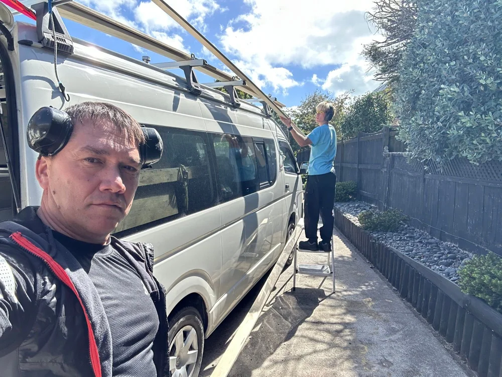 Handyman Botany technician on-site beside the branded van in East
Auckland
