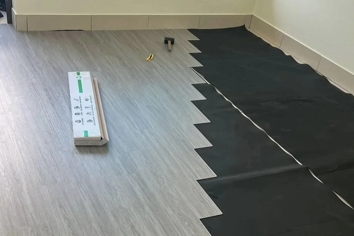 Water-resistant vinyl flooring installation in East Auckland residential bathroom by handyman