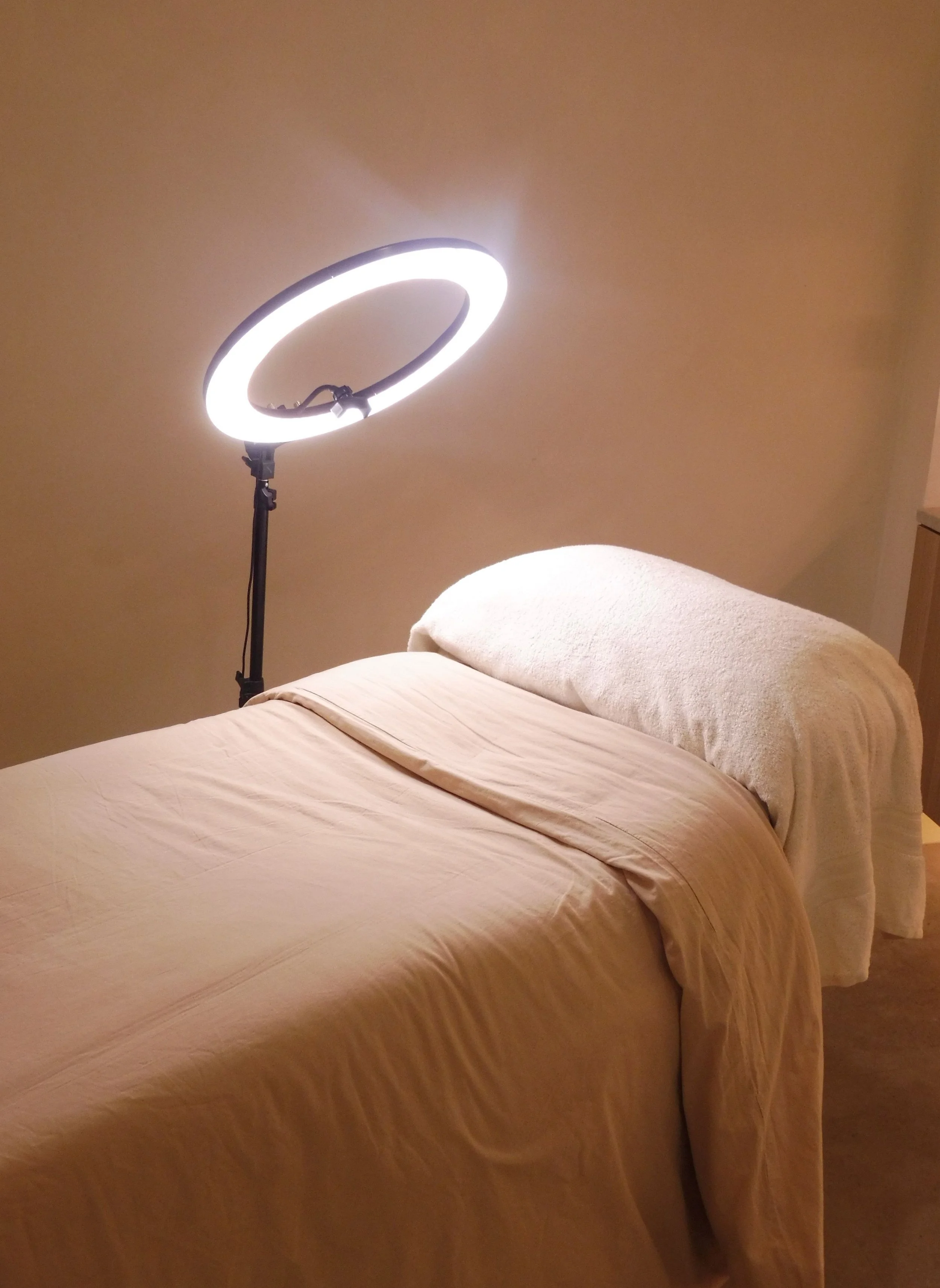 The lash and brow room at Newcastle's AMIRI Studio, servicing in bespoke lash and brow services with an LED ring light to ensure optimal results are made.