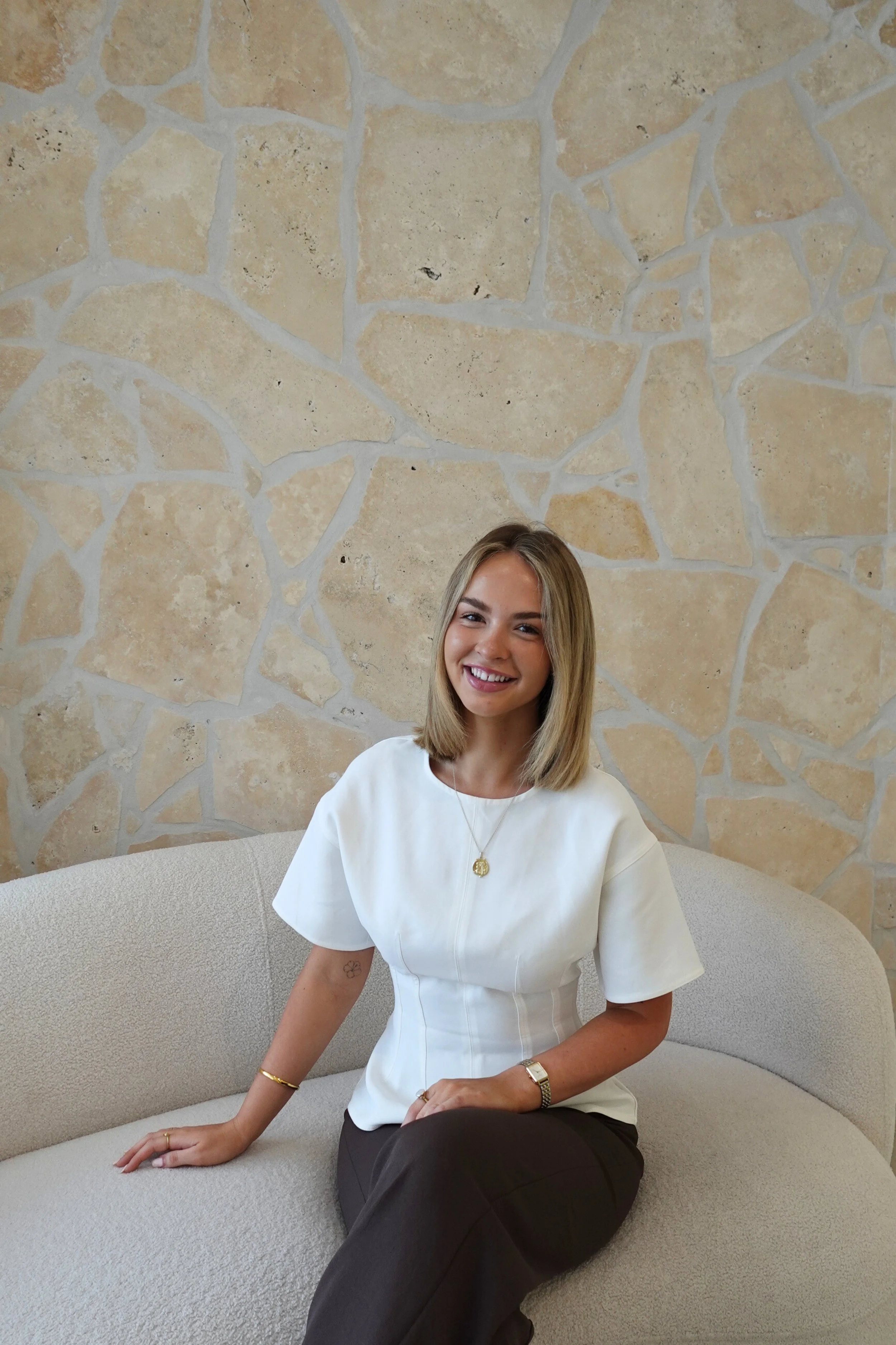 Amiri Studio Employee headshot of Phoebe, a signature therapist