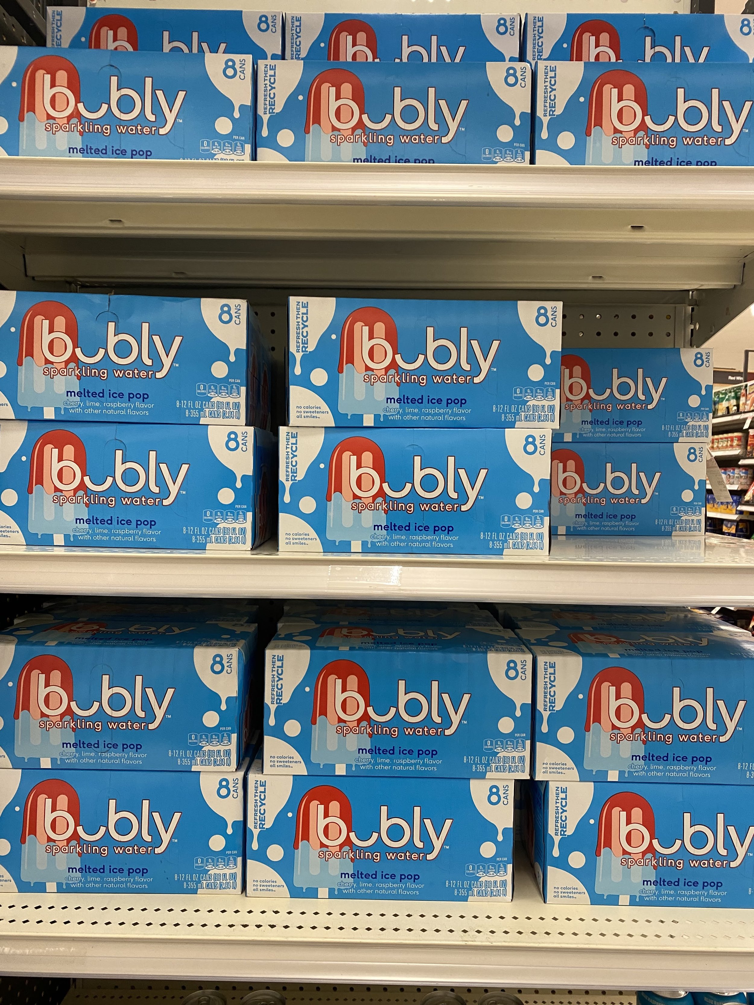 A Shelf of Bubly Brand Melted Ice Pop Flavored Sparkling Water