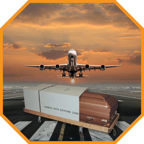 An airplane descending towards a runway with a large cardboard and brown container labeled 'Handle with Extreme Care' on a baggage cart, set against a sunset sky.