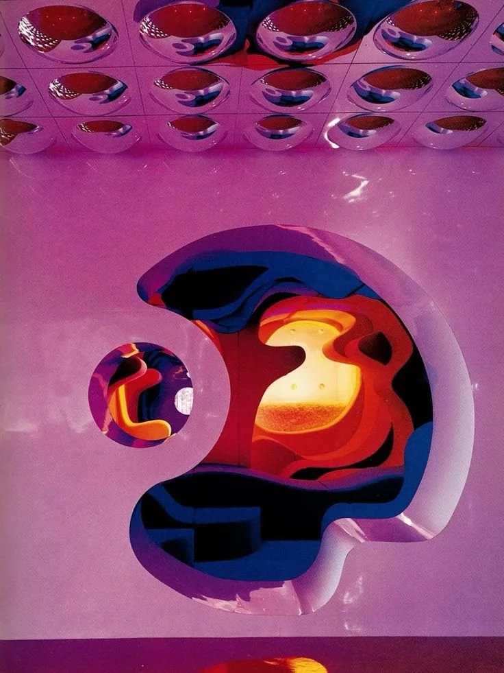 A reflective pink surface with a cutout of the Twitter logo. The reflection shows a colorful, abstract sunset scene with orange, yellow, and blue hues.