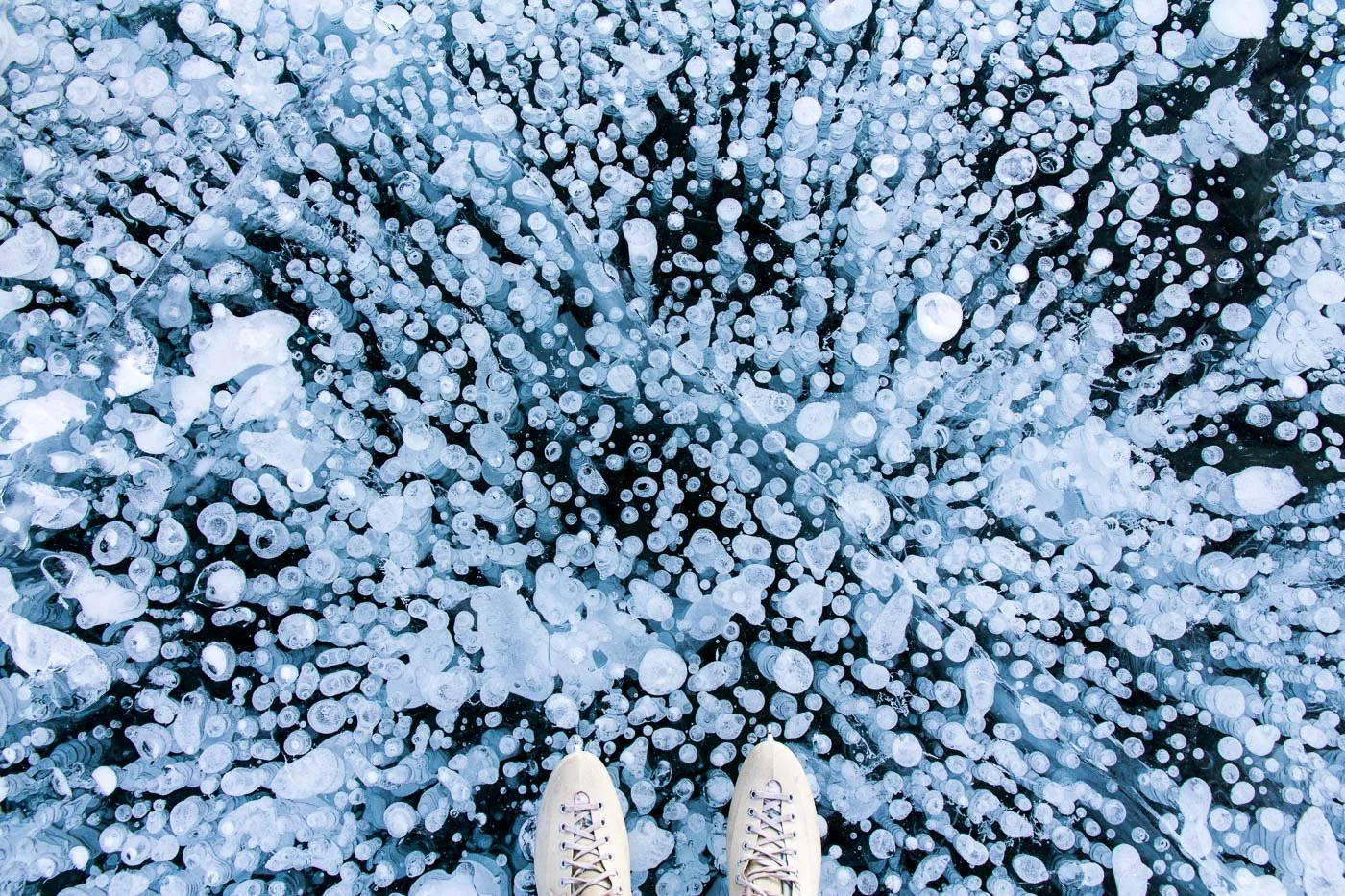 Skating on wild ice with methane bubbles Canadian winter photography