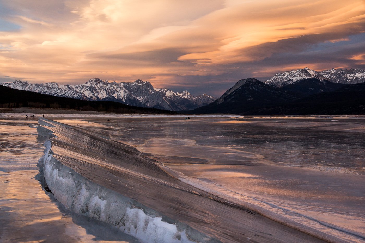 ice heaves and chinook clouds at sunset Abraham Lake Canada
