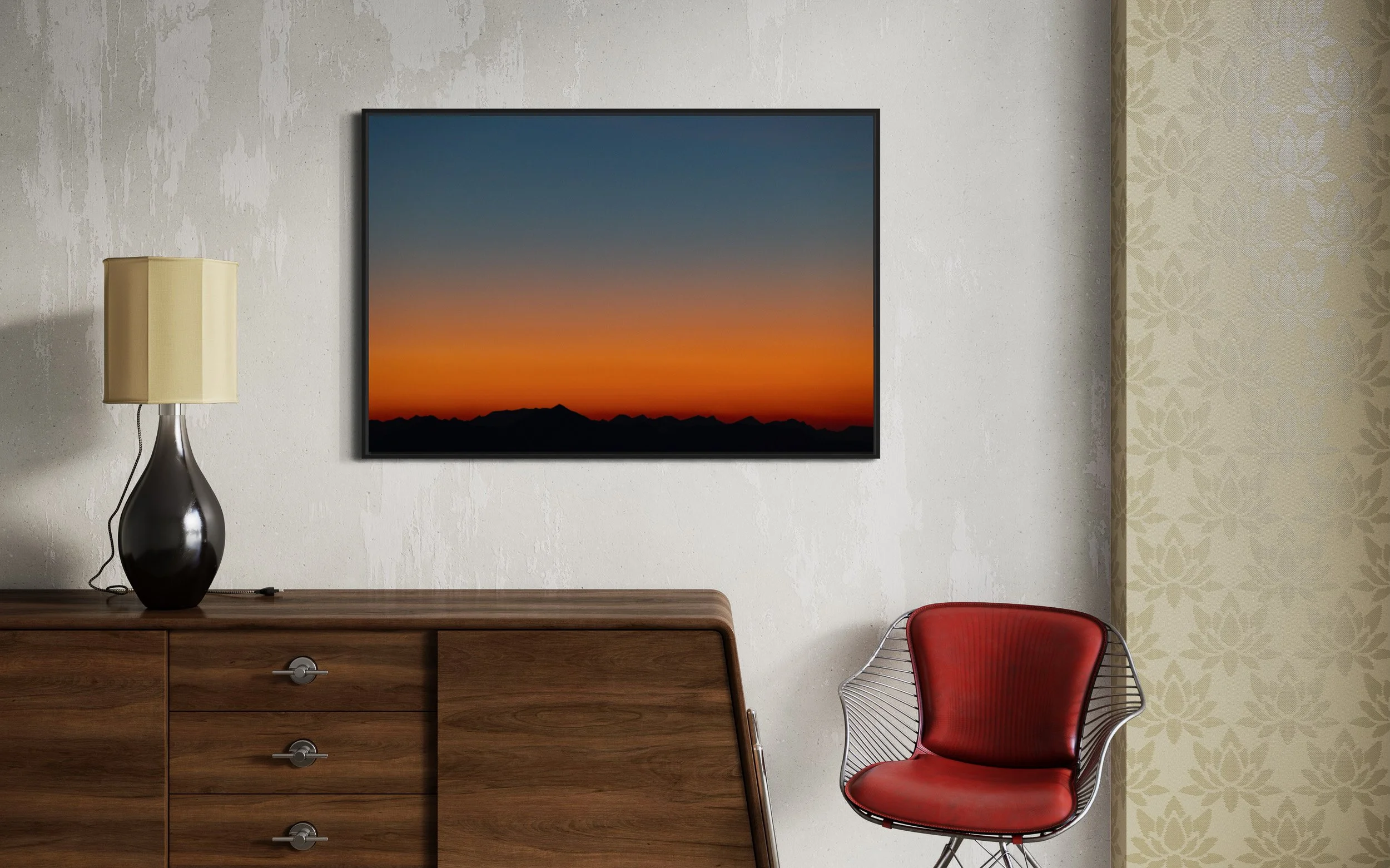 picture of mountains at sunset on wall