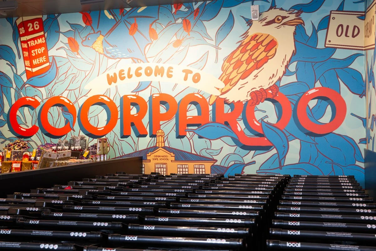 Coles Coorparoo mural by Jimmy Patch with Jacky Winter (title detail above shopping trolleys)