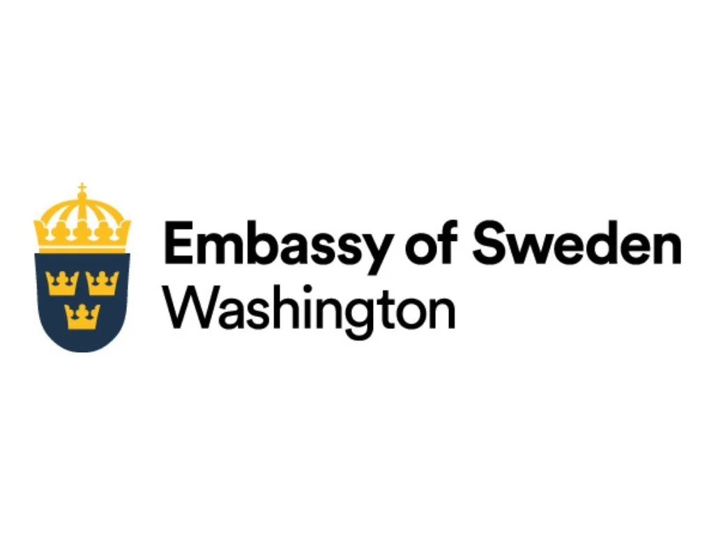 Logo of the Embassy of Sweden in Washington, featuring a Swedish coat of arms with three crowns and a crown on top, with text indicating 'Embassy of Sweden Washington'.