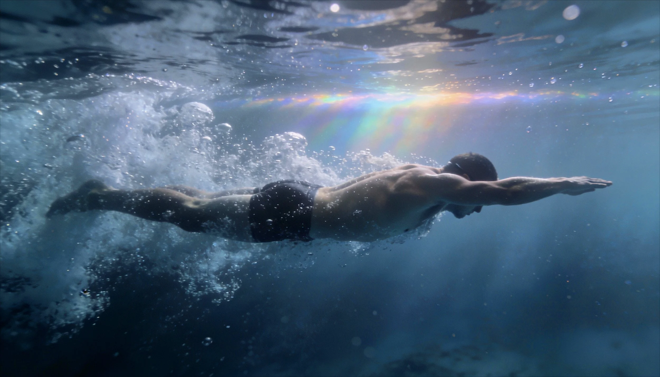 freepik__underwater-wide-sideview-photo-of-professional-mal__41177.jpeg