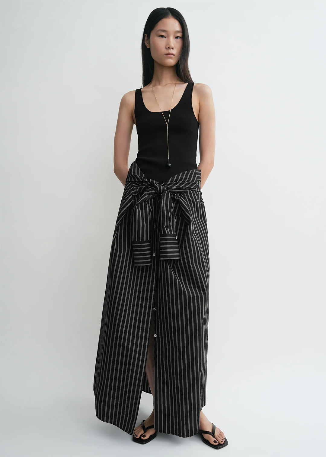 TOTEME_ECOM_PF25_SS_GARDEROB__252-WRT0504-YA0187_COMPACT_KNIT_TANK_BLACK_A-1.png