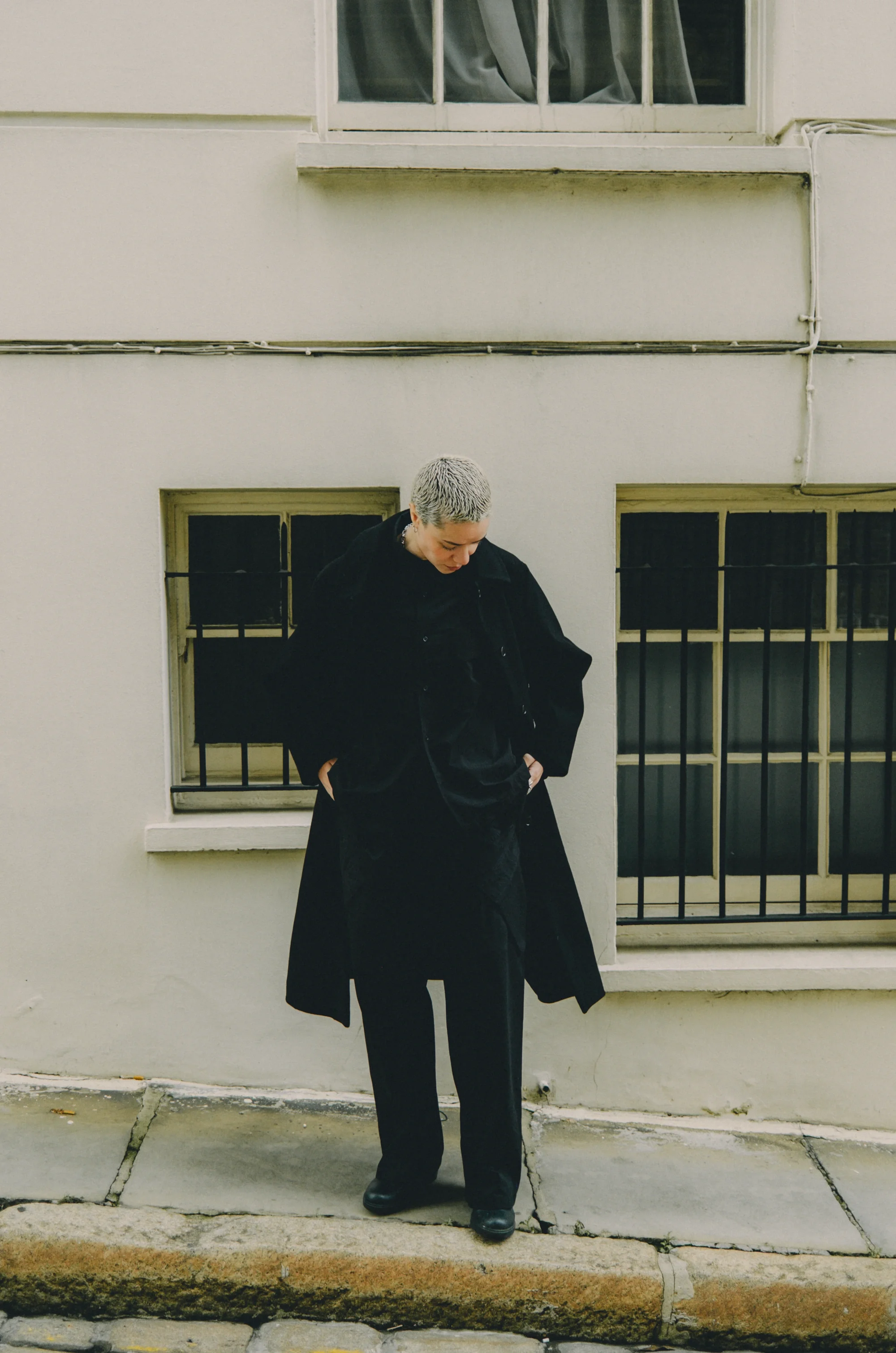 Quiet luxury editorial aesthetic featuring a model outdoors. High fashion photography by SVS® Sibeli Velázquez. Photographer based in Mexico City, CDMX.