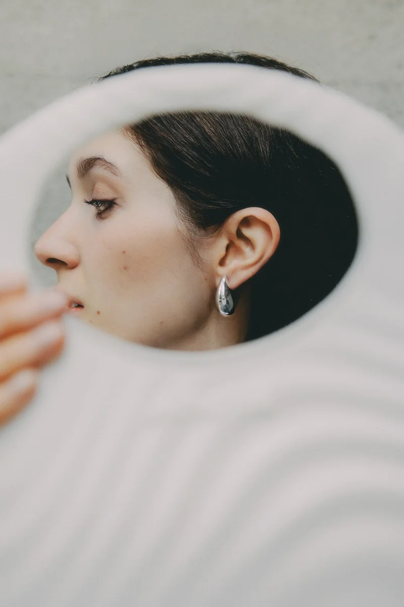 Quiet luxury editorial aesthetic featuring a model outdoors. High fashion photography by SVS® Sibeli Velázquez. Photographer based in Mexico City, CDMX.