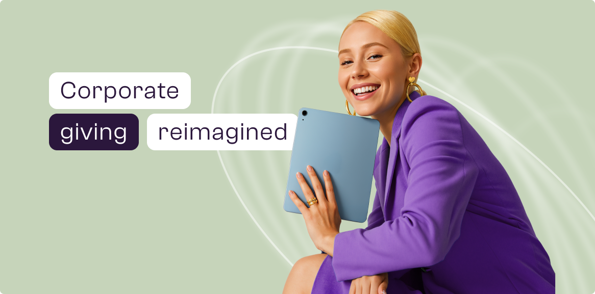 A young woman in a purple blazer sitting, holding a tablet, smiling, with the text 'Corporate giving reimagined' on a pastel green background.