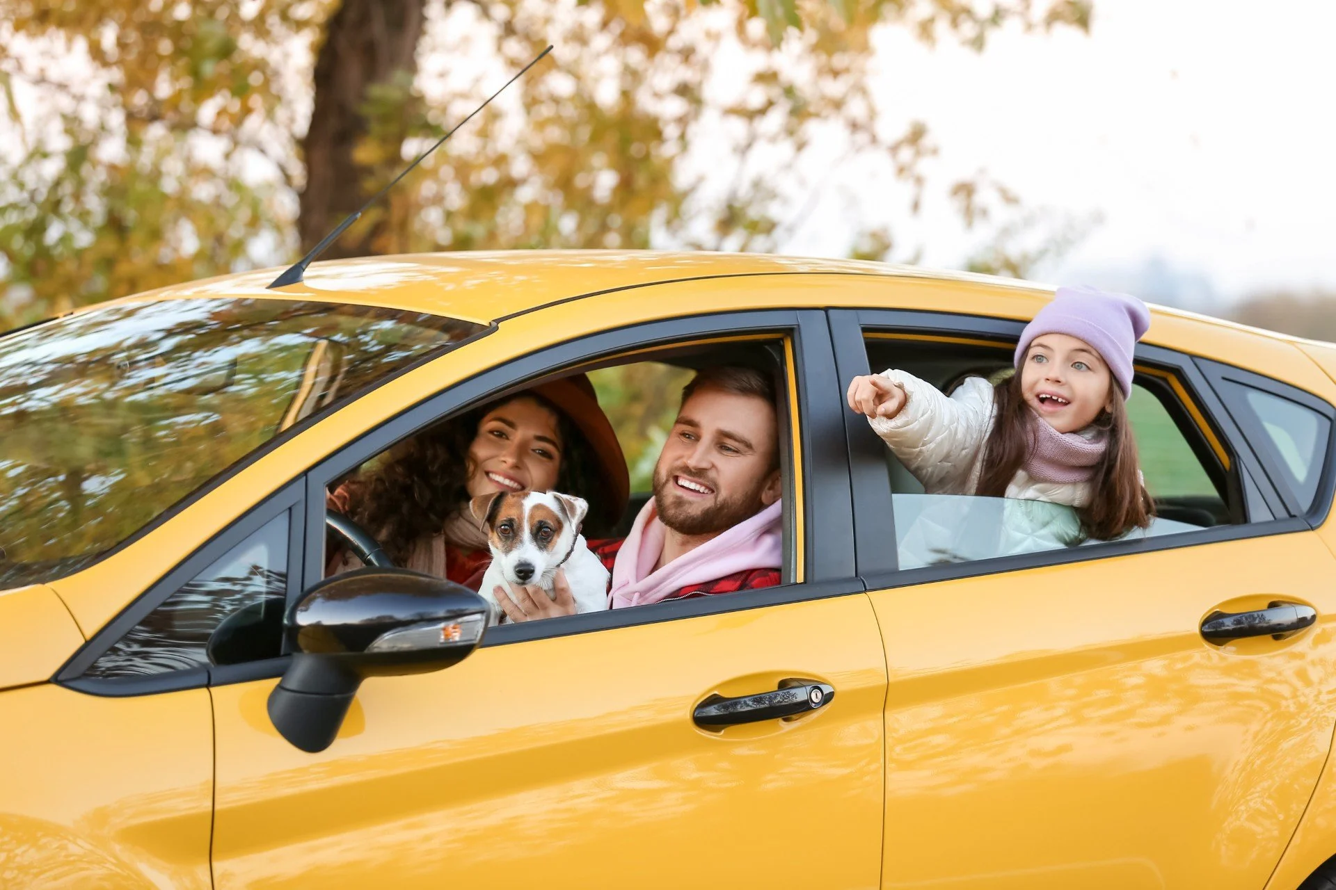 Family in Yellow Car.jpg