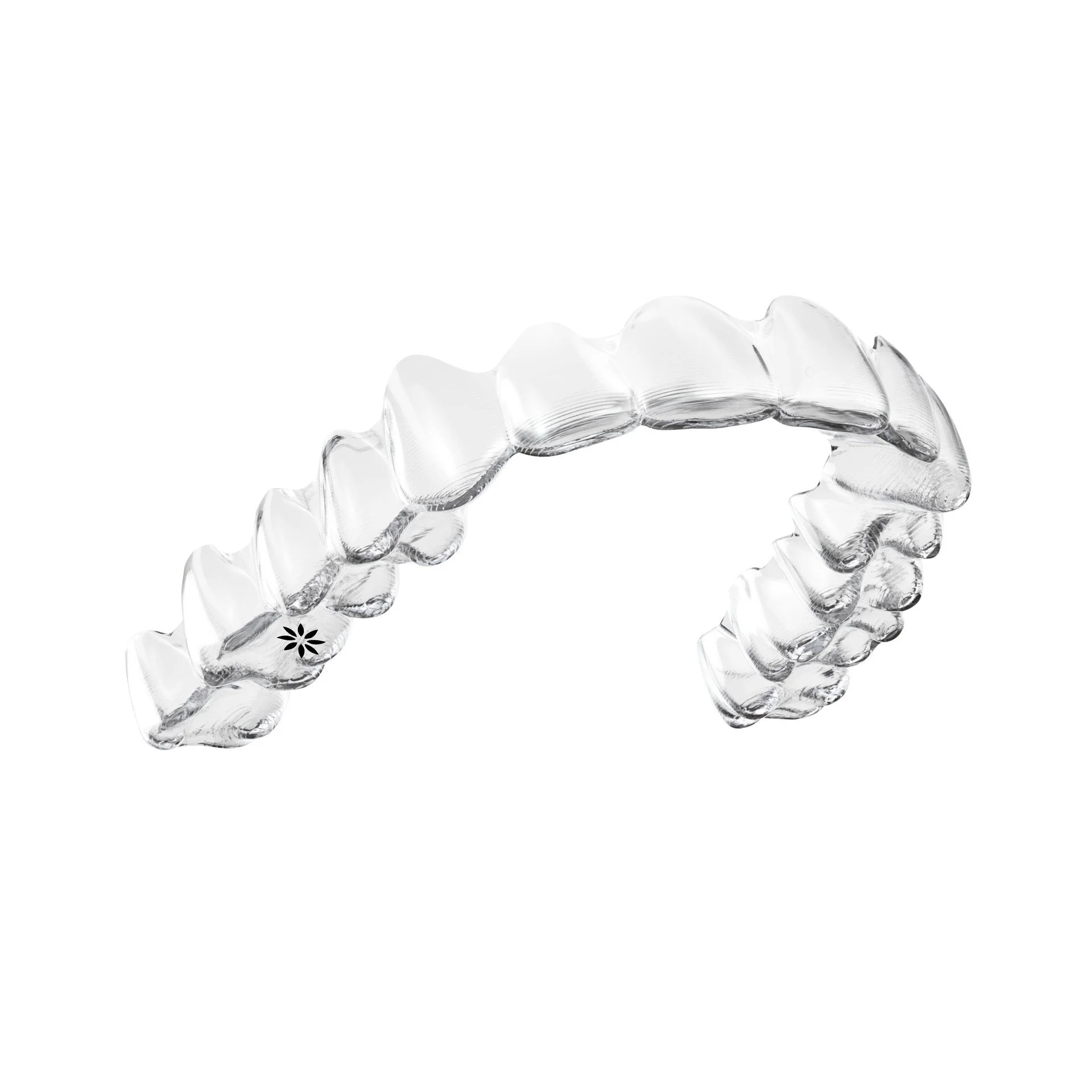 A photo of a clear Invisalign teeth aligner with a white background.