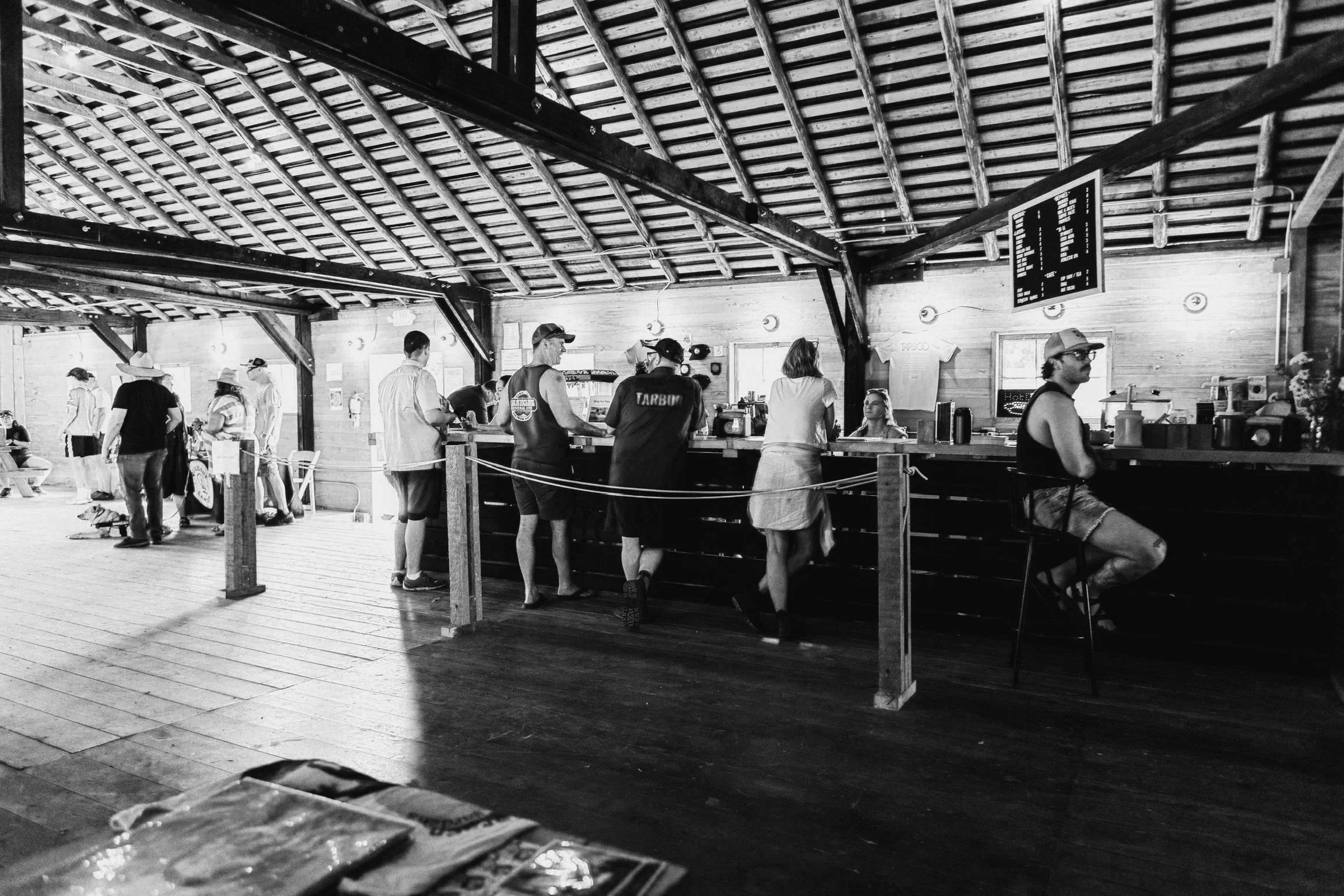 People enjoying food and drink at the bar