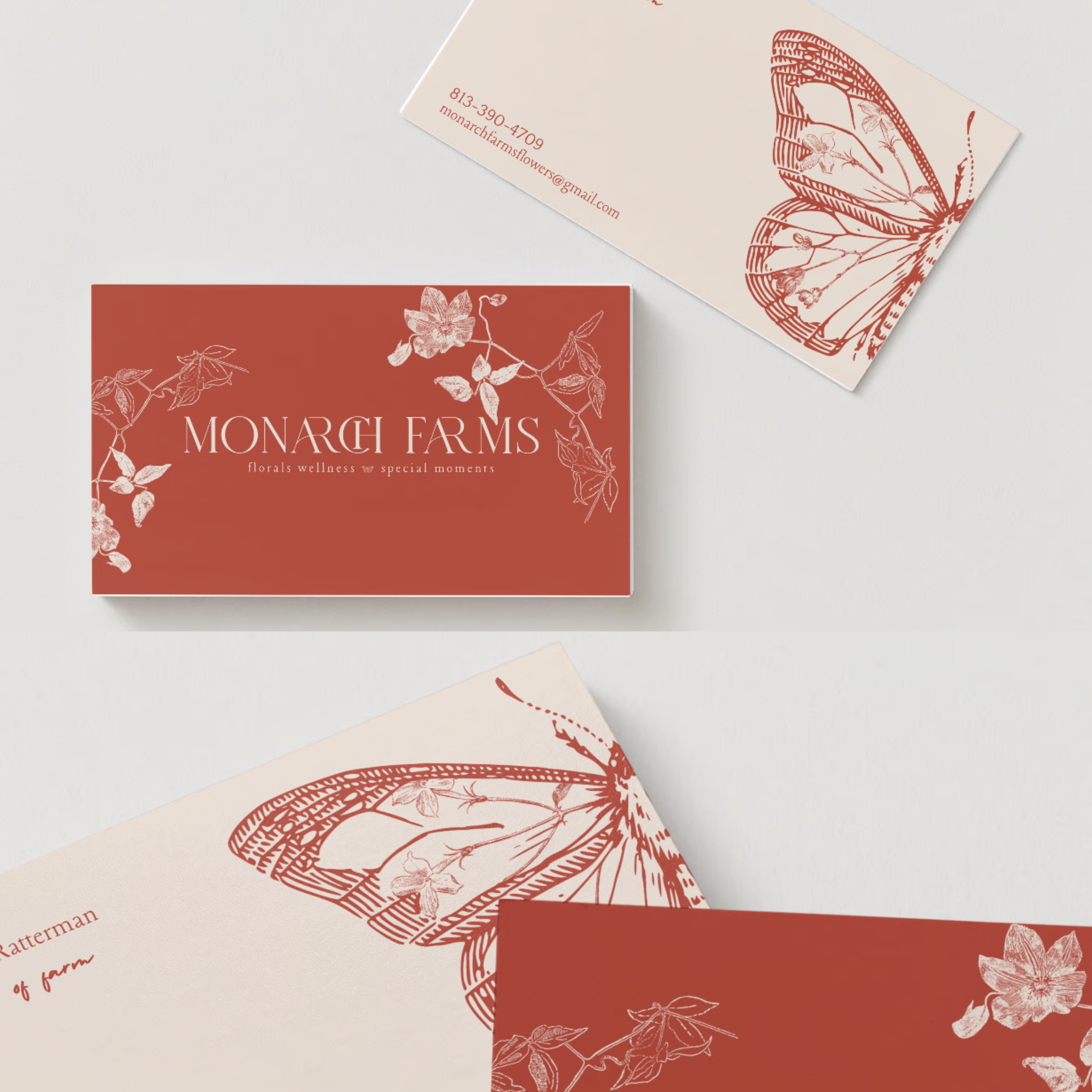 Business cards and a box for Monarch Farms, featuring floral and butterfly illustrations in a red and cream color theme.