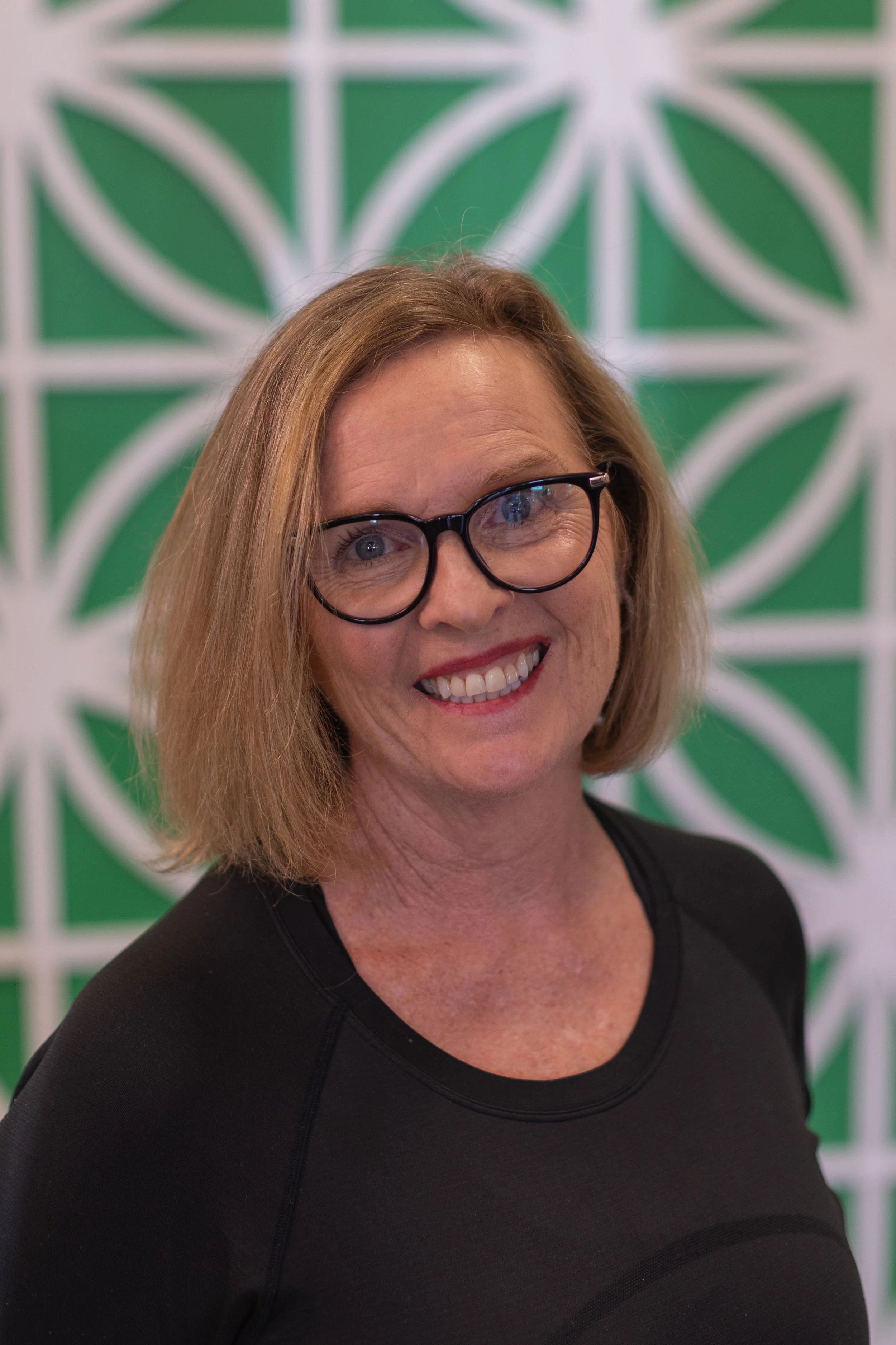 Rochelle, certified Pilates instructor at Charis Pilates Poway near Carmel Mountain, recognized for her expert cueing, personal attention, and hands-on guidance