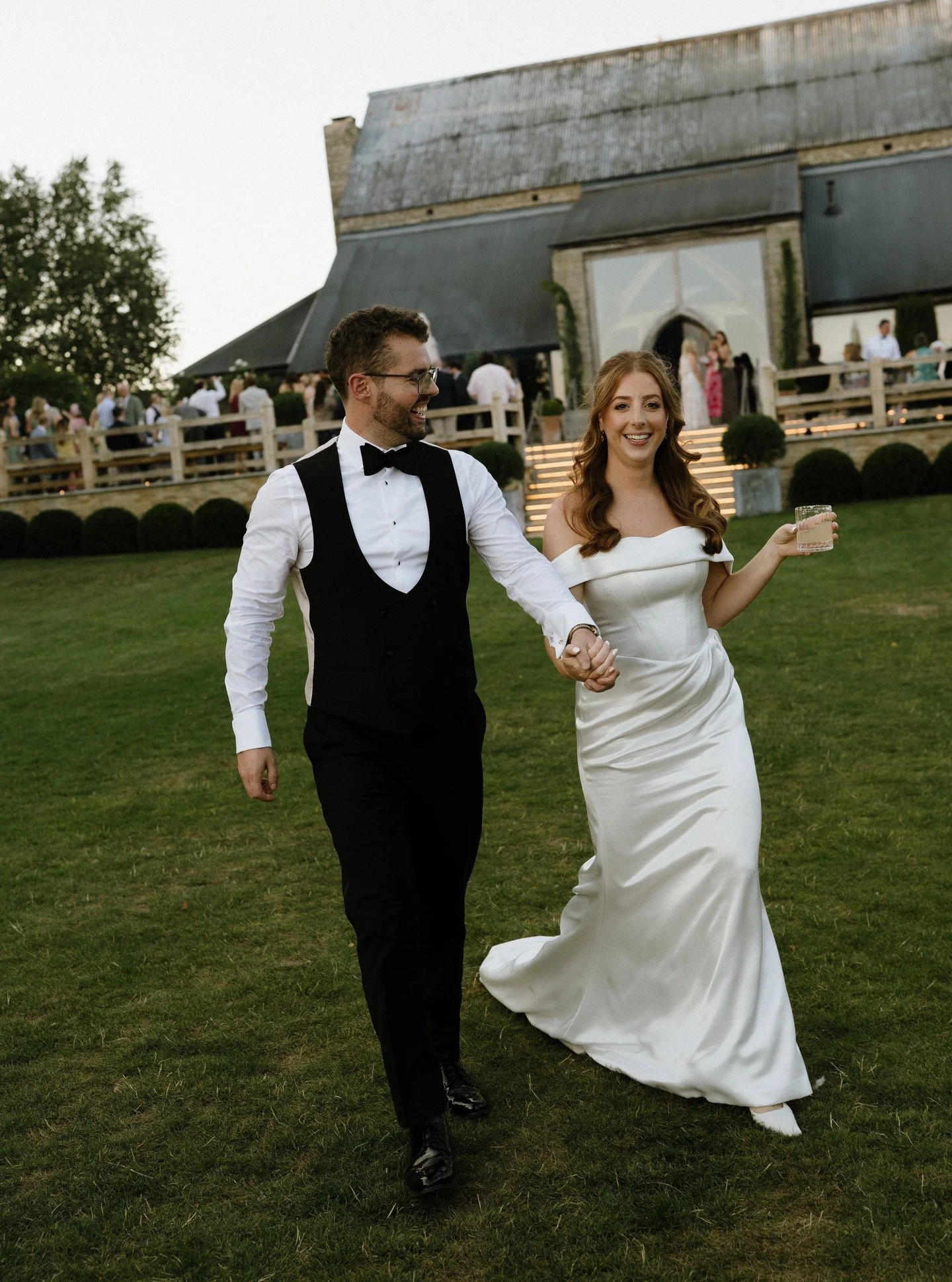 How I like my couples to head into some early evening portraits. Hand in hand and with a cocktail wherever possible. E&amp;A are on my screen right now with their beautiful day hosted at Cripps Barn in the Cotswolds.