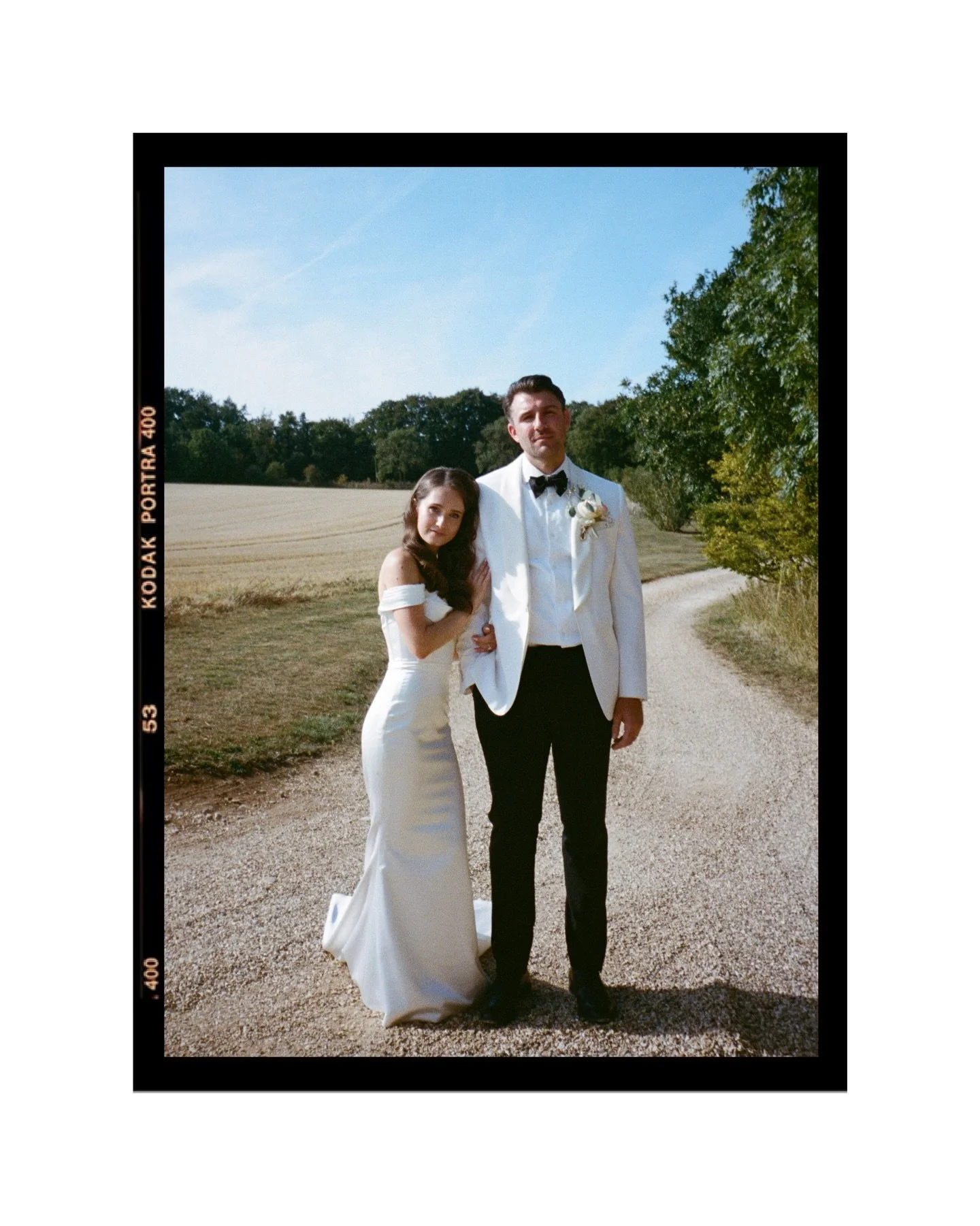 🎞️ Emily and Joe and a few frames on that gorgeous 35mm film which you are all eating up. 
.
Analogue photography gives a moment of quiet magic during the whirlwind which is your wedding day. A nostalgic and characterful format to complement your hu