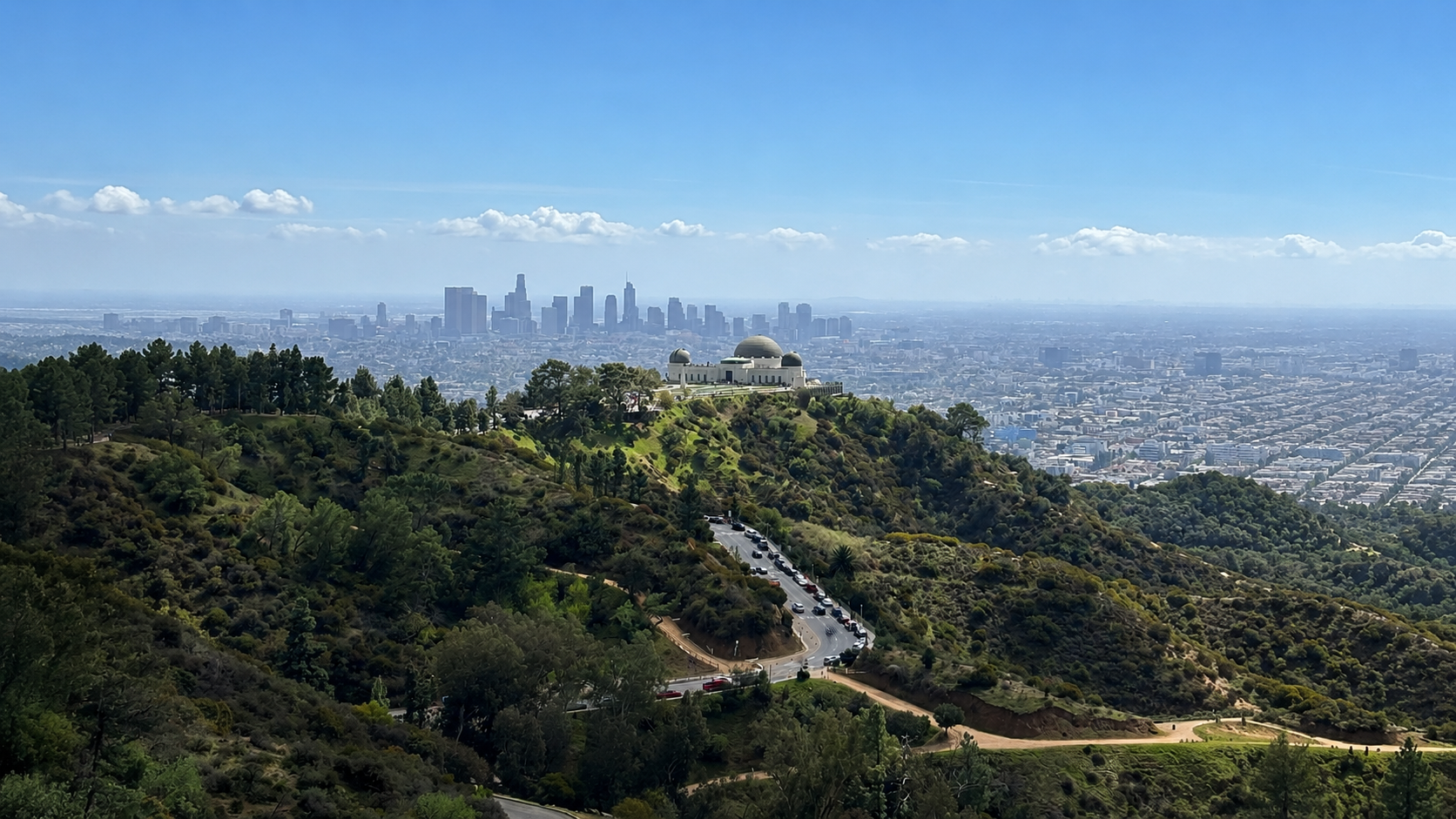 Panoramic view of Griffith Observatory and the Los Angeles skyline featured on Connected Therapy of California's therapy service page. Offering virtual individual and couples therapy throughout Los Angeles and California.