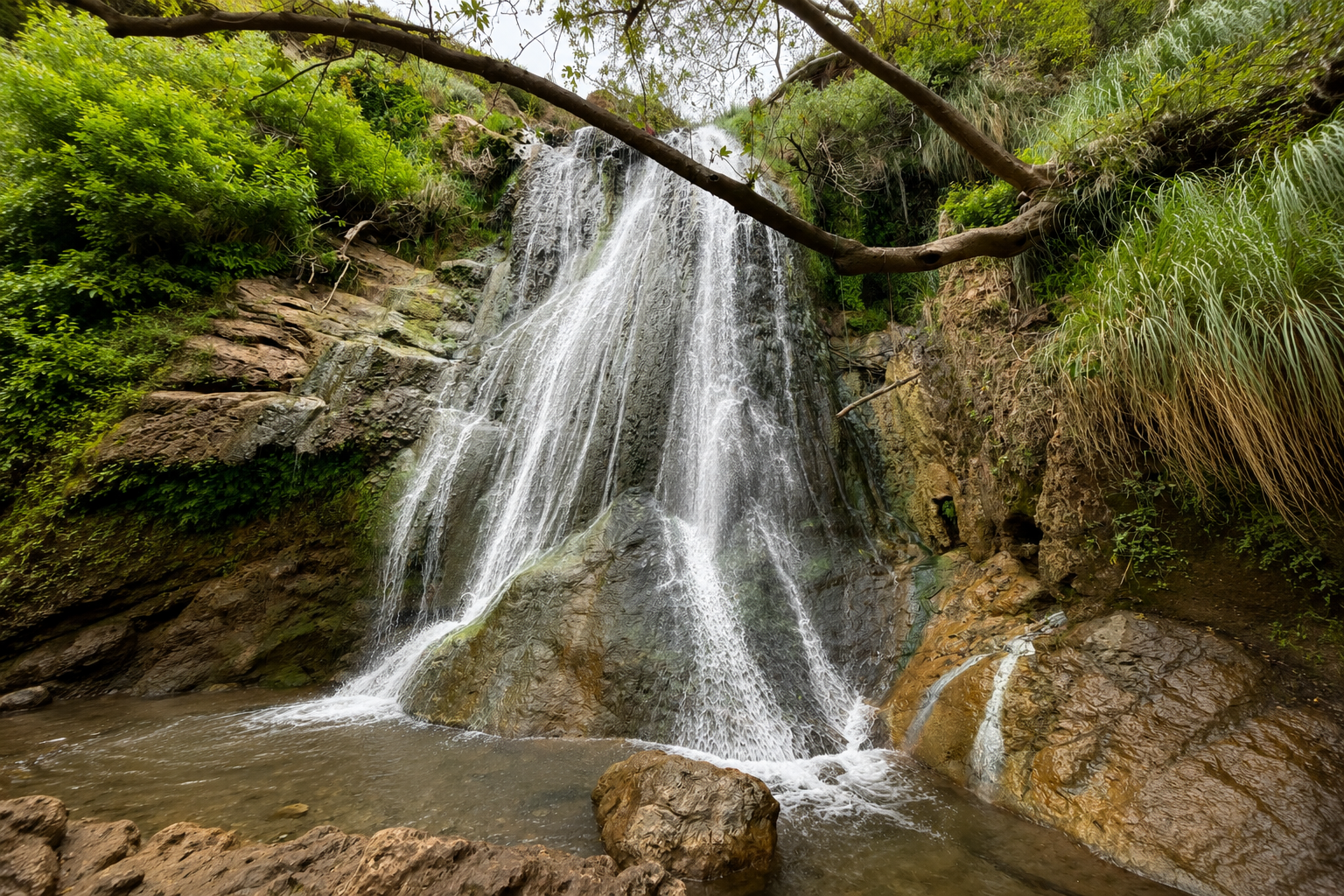 Peaceful waterfall in a lush natural setting representing healing, connection, and emotional restoration for couples seeking marriage counseling and relationship therapy in Los Angeles, California.