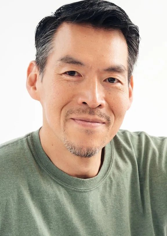 KEN L.