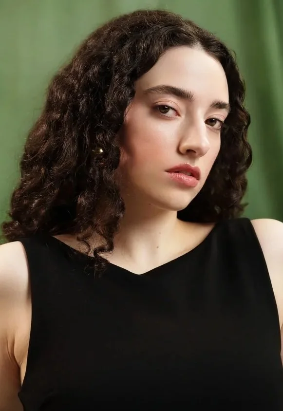 ALEXANDRA T.
