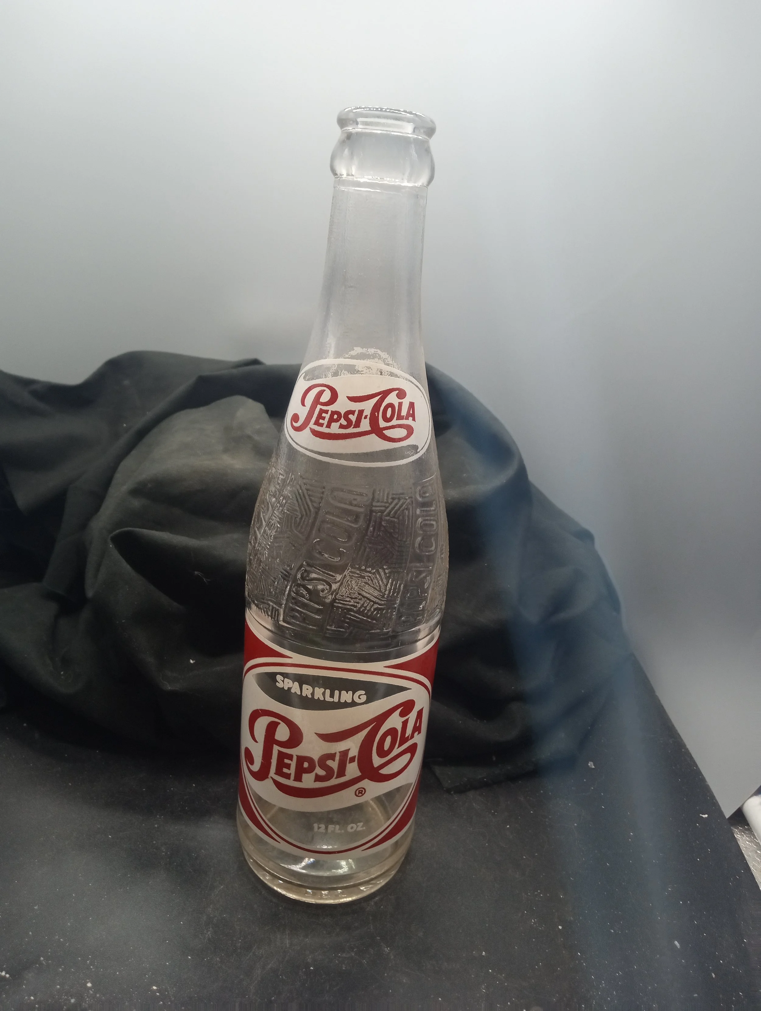 AGE - 1954 - TYPE - MACHINE - FRONT - (shoulder) PEPSI-COLA (body) SPARKLING / PEPSI-COLA(R) / 12 FL. OZ. - BACK - (shoulder) PEPSI / 435 (body) FRANCHISED BOTTLER: / PEPSI-COLA BOTTLING CO. / ROCK HILL, S.C. - BOTTOM - DES. PAT. 120277  10  B  54  1