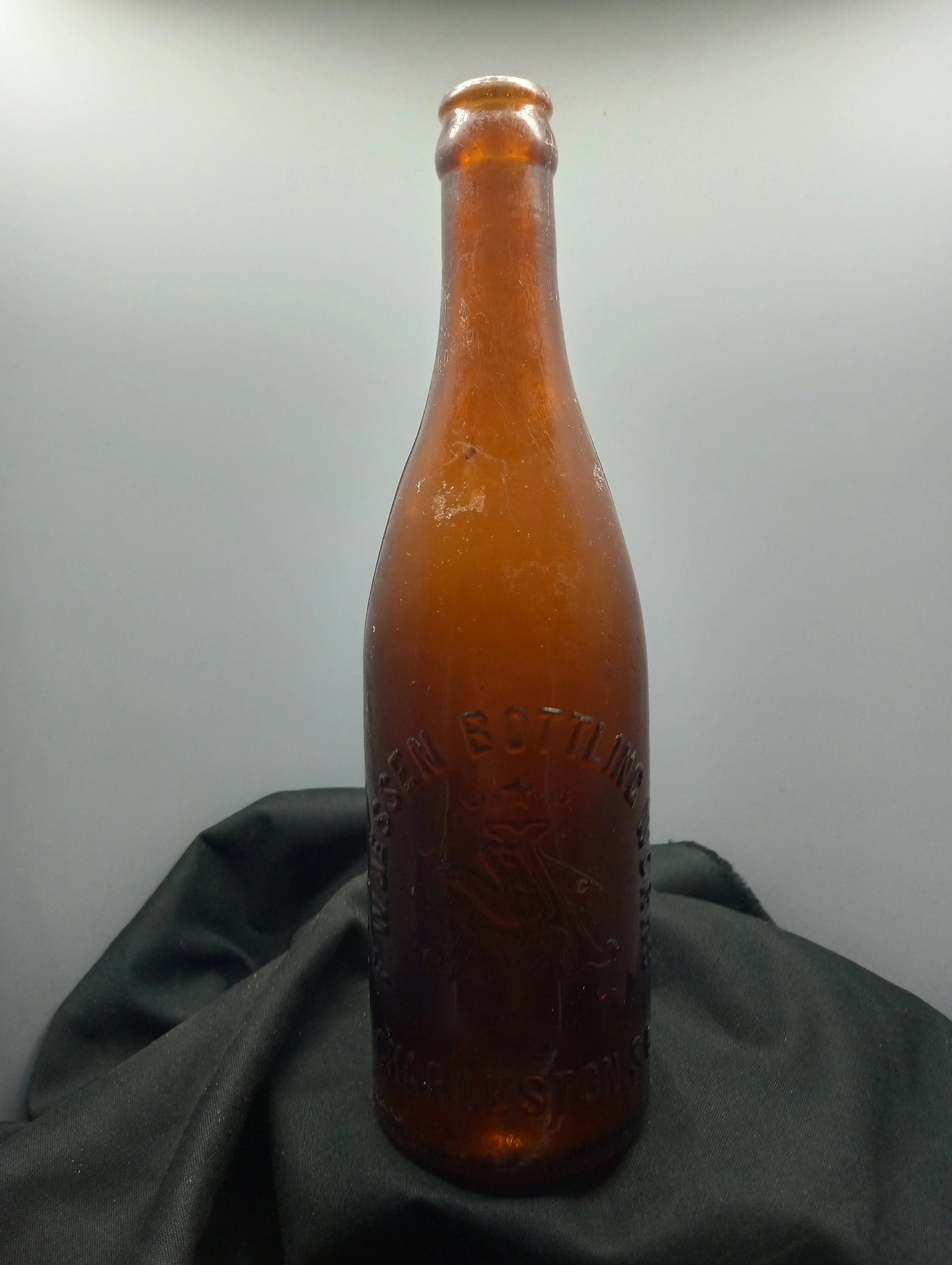 AGE - 1890 TYPE - APPLIED TOP
FRONT - F. W. JESSEN BOTTLING WORKS CHARLESTON, S.C. BACK - L. C. A. ROESSLER PROP'R THIS BOTTLE NOT TO BE SOLD COLOR - AMBER RARITY - SCARCE