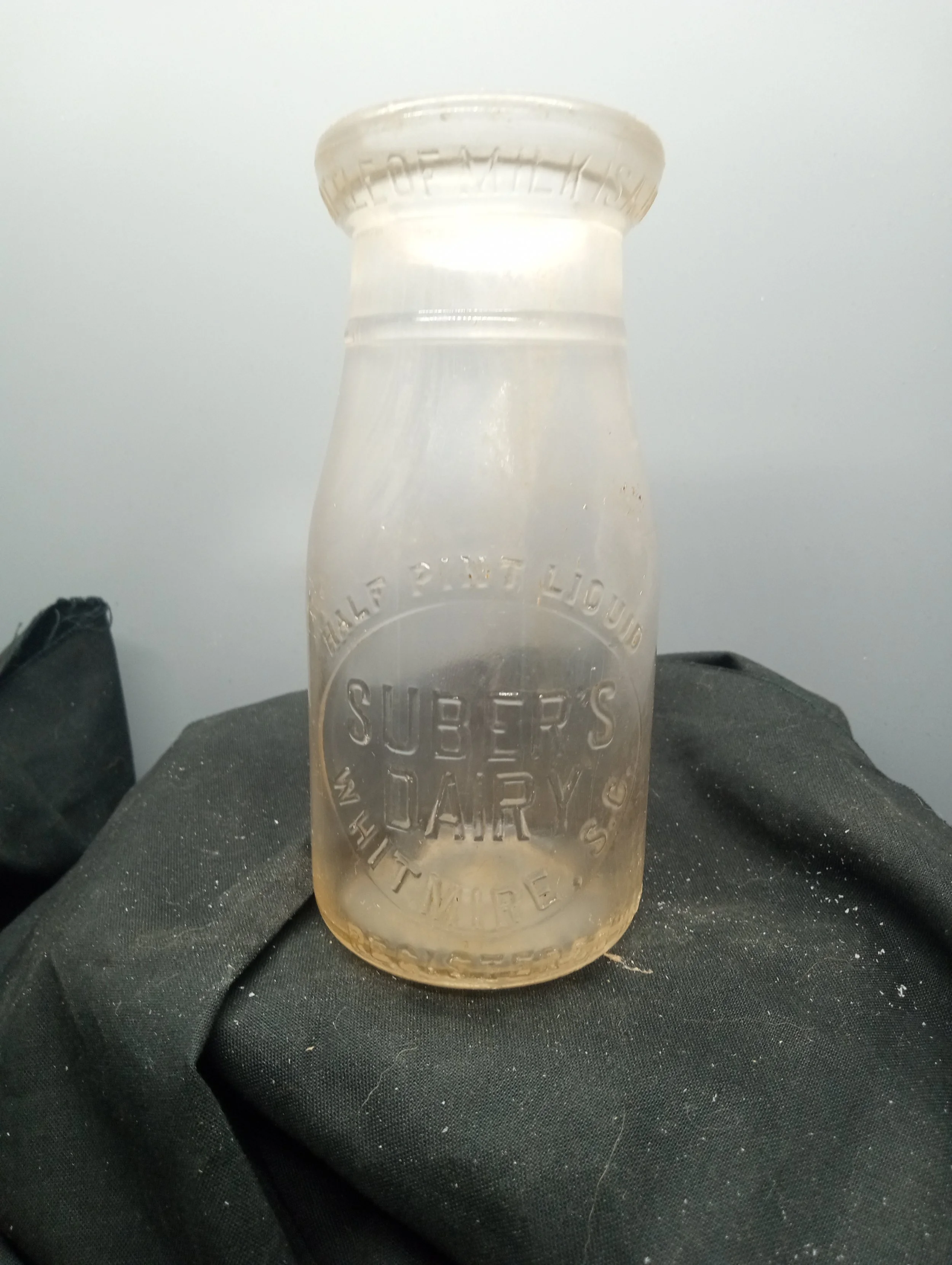 TOP - A BOTTLE OF MILK IS A BOTTLE OF HEALTH - FRONT - HALF PINT LINQUID / SUBER'S / DAIRY / WHITMIRE, S.C. / REGISTERED 11 B 53
