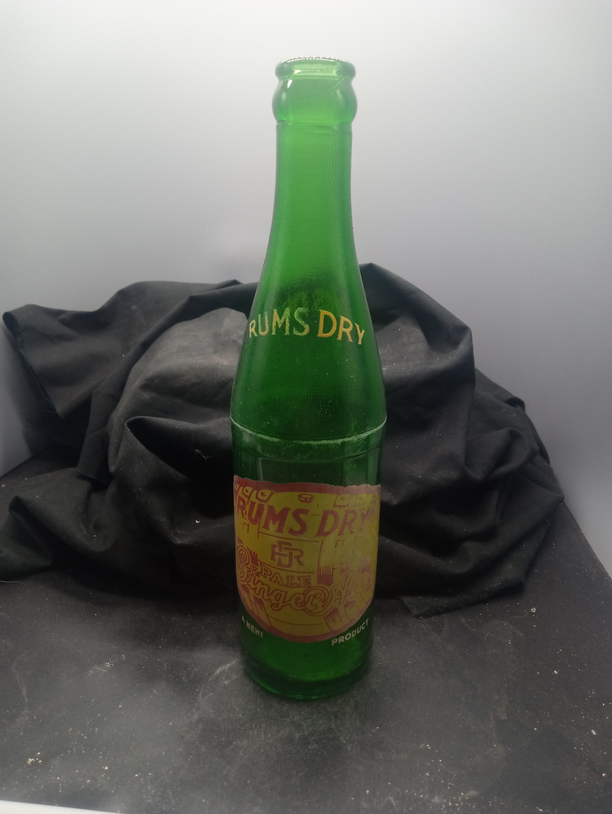 AGE - 1954 - TYPE - MACHINE - FRONT - (shoulder) RUMS DRY (body) RUMS DRY / PALE / GINGER ALE / A NEHI  PRODUCT - BACK - BOTTLE STERILIZED / BEFORE FILLING / CONTENTS 10 FL. OZS. / PROPERTY OF / ROYAL COWN BOTTLING CO. / ORANGEBURG, S. C. - BOTTOM - 