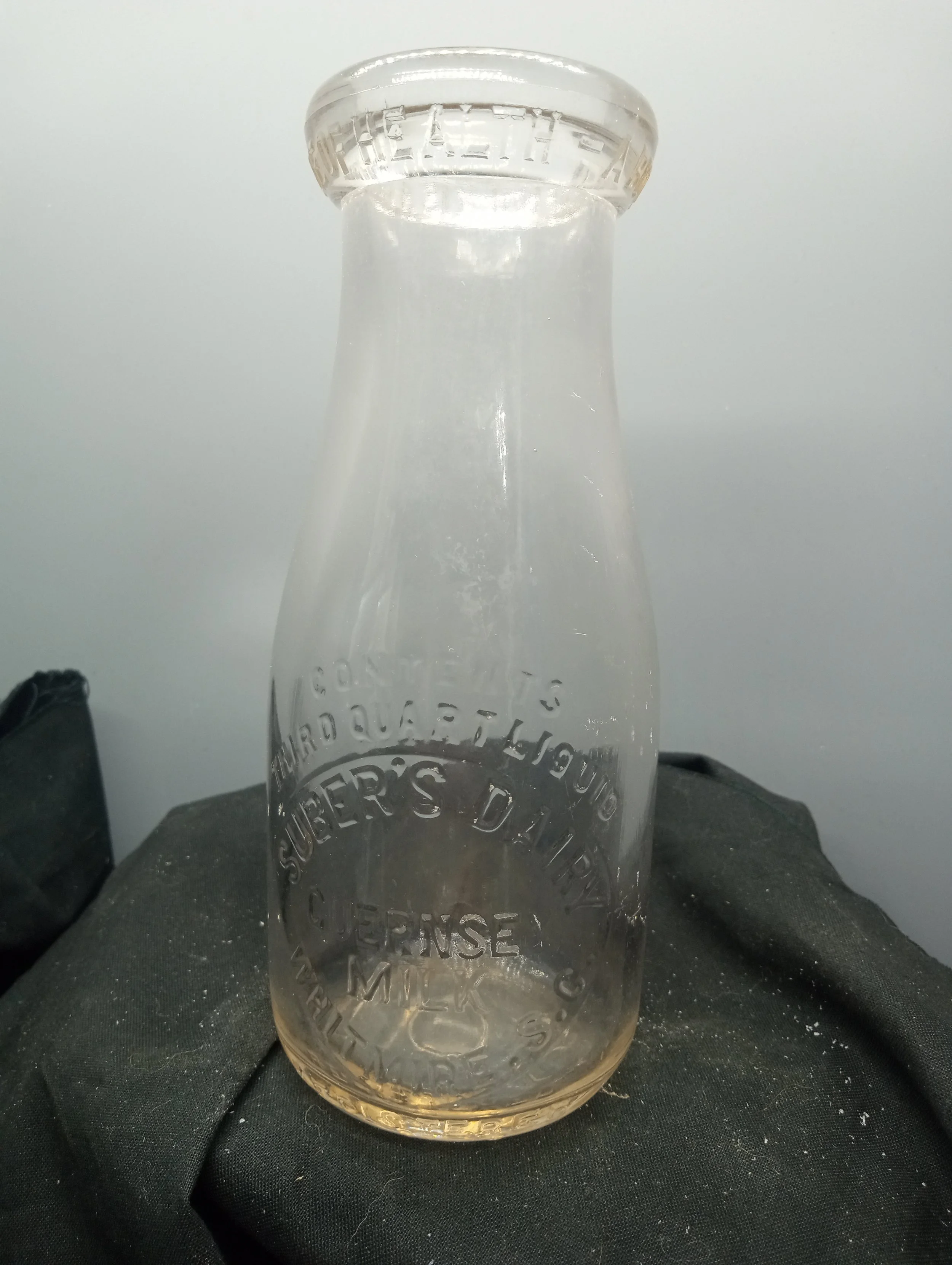 TOP - A BOTTLE OF MILK IS A BOTTLE OF HEALTH - FRONT - CONTENTS /THIRD QUART LIQUID / SUBER'S DAIRY / GUERNSEY / MILK / WHITMIRE, S.C. / REGISTERED