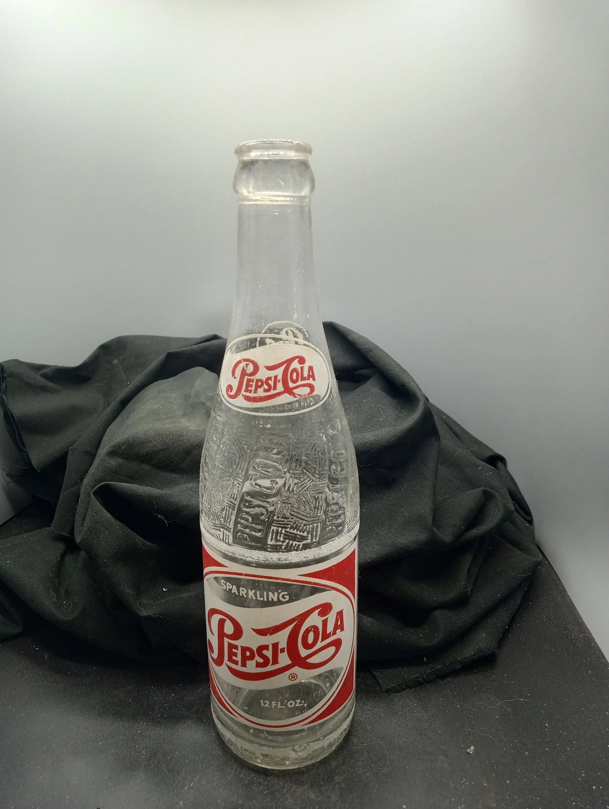 AGE - 1955 - TYPE - MACHINE - FRONT - (shoulder) PEPSI-COLA - (body) SPARKLING / PEPSI-COLA (R) / 12 FL. OZ. - BACK - (shoulder) PEPSI / 535 (body) FRANCHISED BOTTLER; /PEPSI-COLA BOTTLING CO. / FLORENCE, S.C. - BOTTOM - L G W  5  B 55  15 - COLOR - 