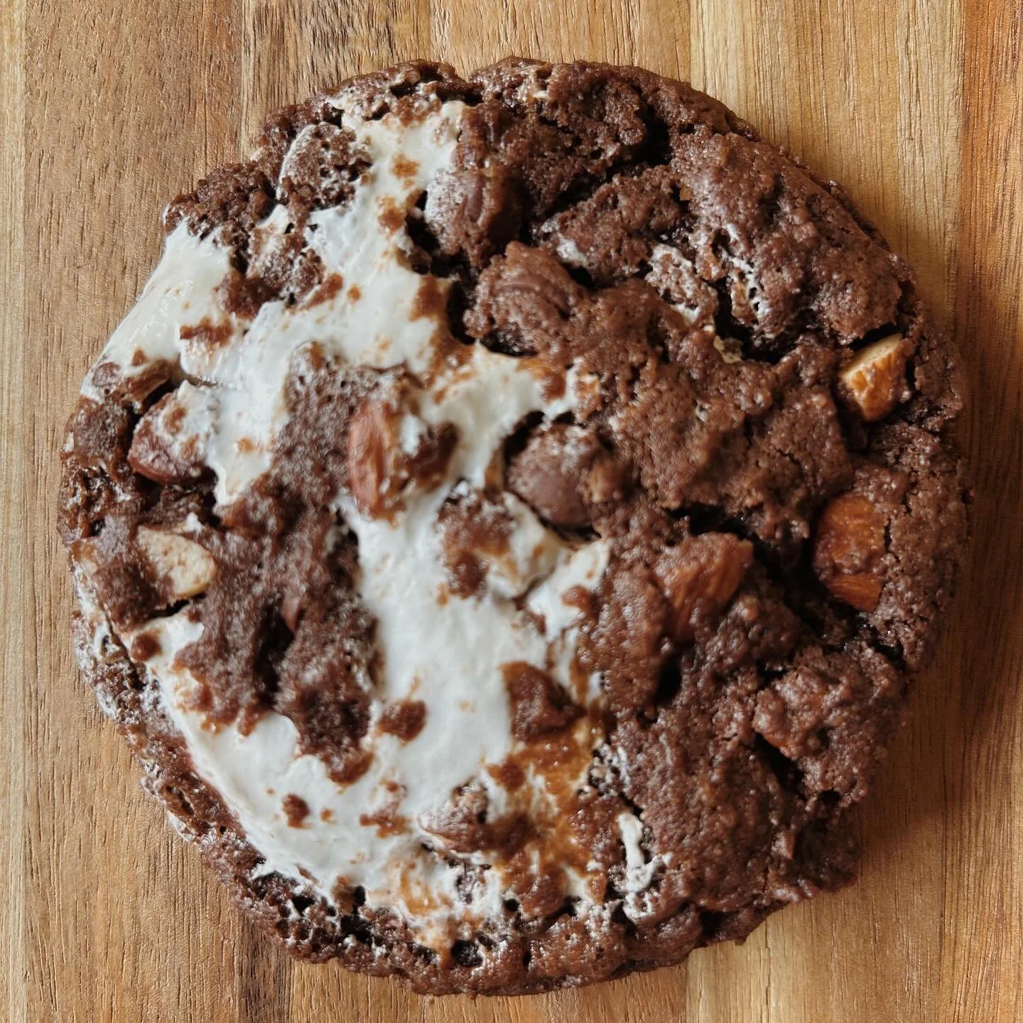 Rocky Road. 🖤

Chocolate dough, chocolate chips, marshmallow cream swirls, and toasted almonds. 

Rich, chocolaty and nutty goodness with a touch of fluff.

Available now.