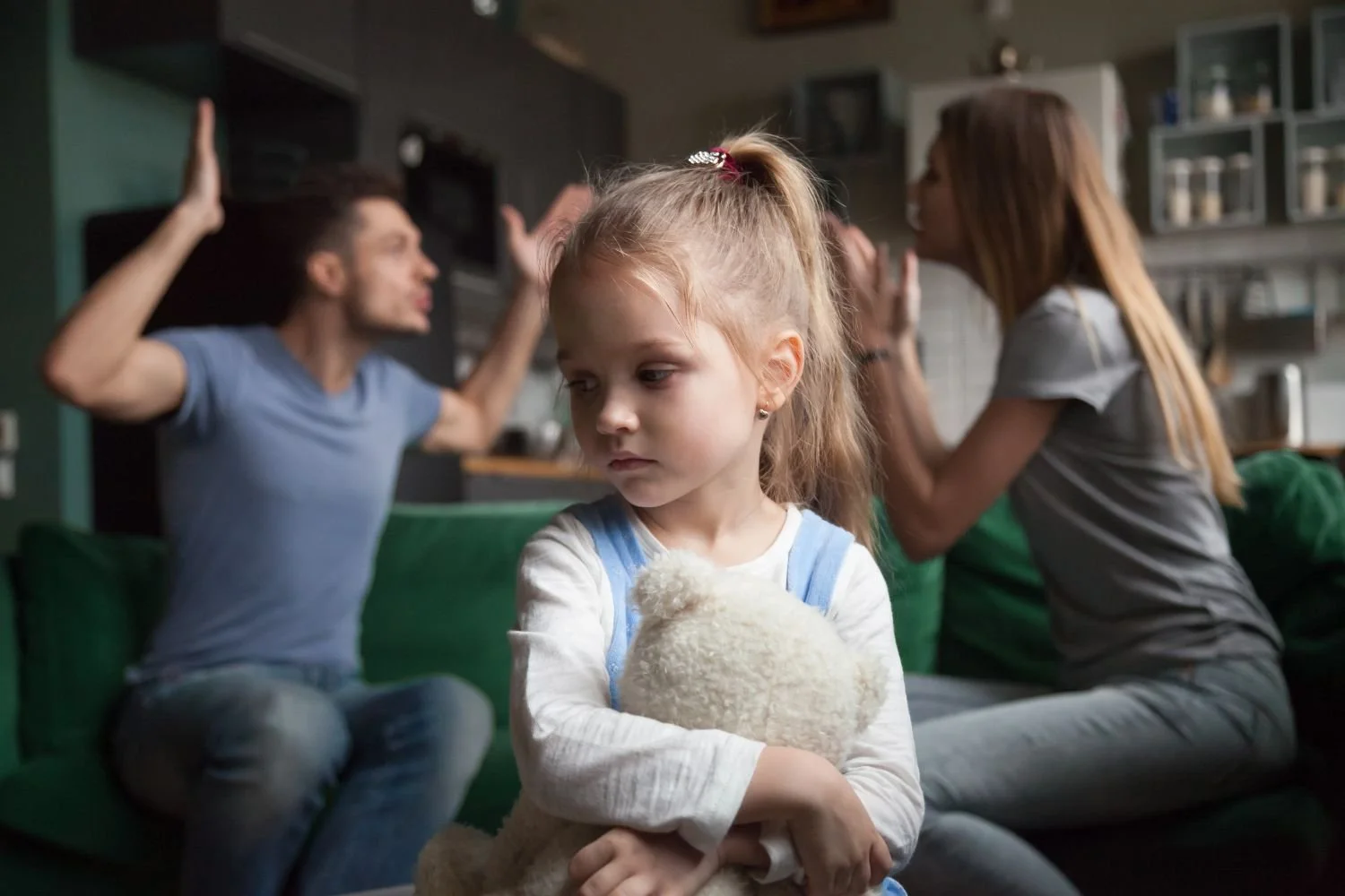 A little girl experiencing learned helplessness with parents fighting in Calgary.