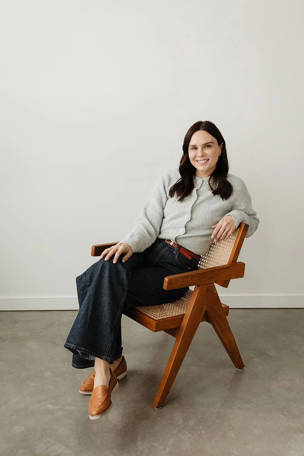 Calgary therapist, Kelsi Mader sitting during addictions counselling in Calgary.