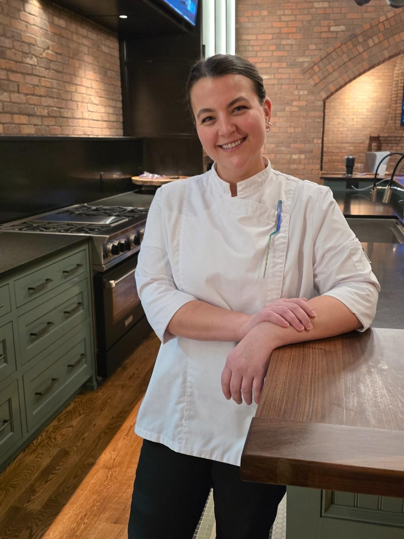 Chef Jaden Stark, co-founder of Gourmet All Day, in a client's kitchen