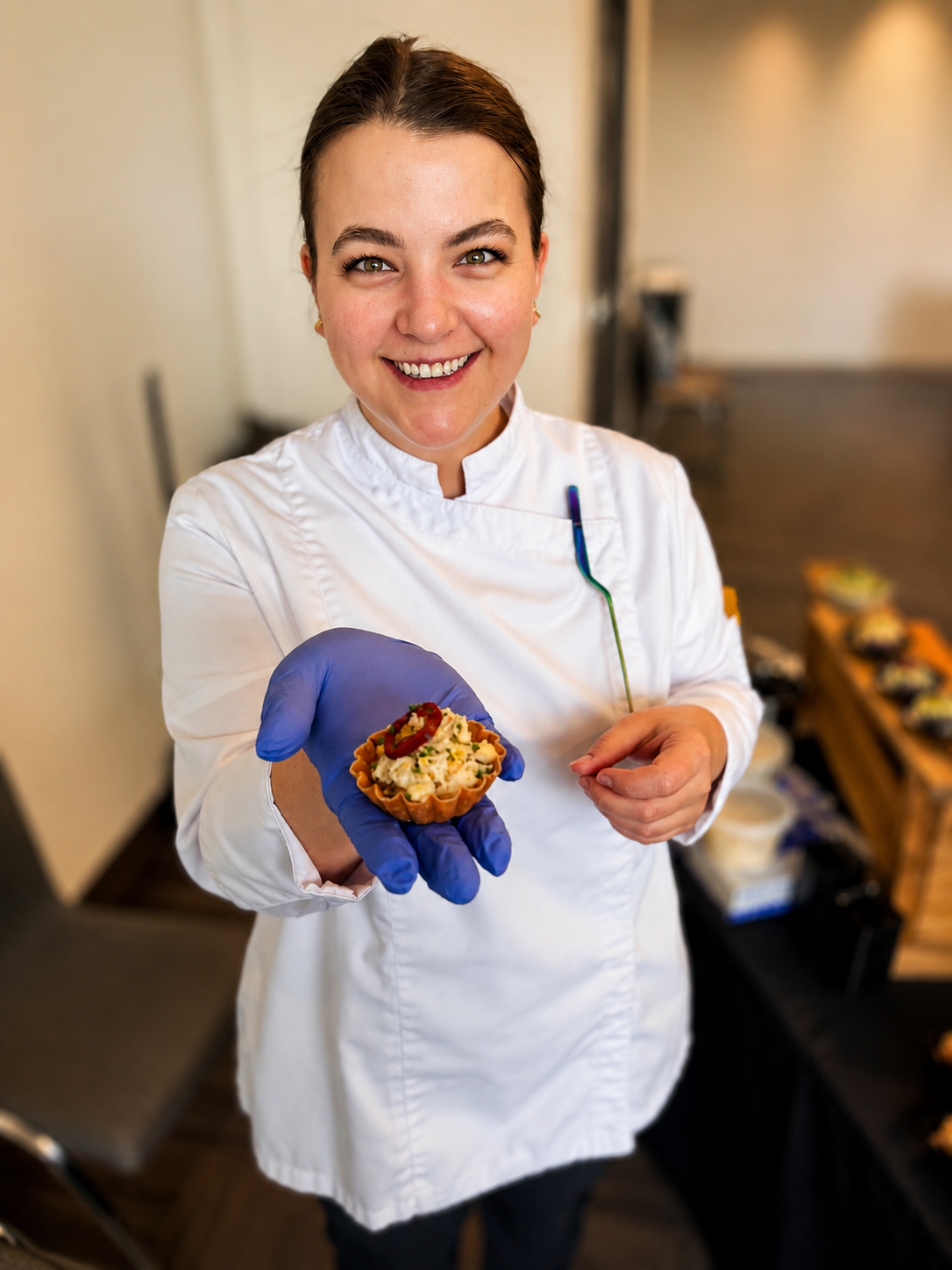 Gourmet All Day chef presenting a freshly prepared tartlet