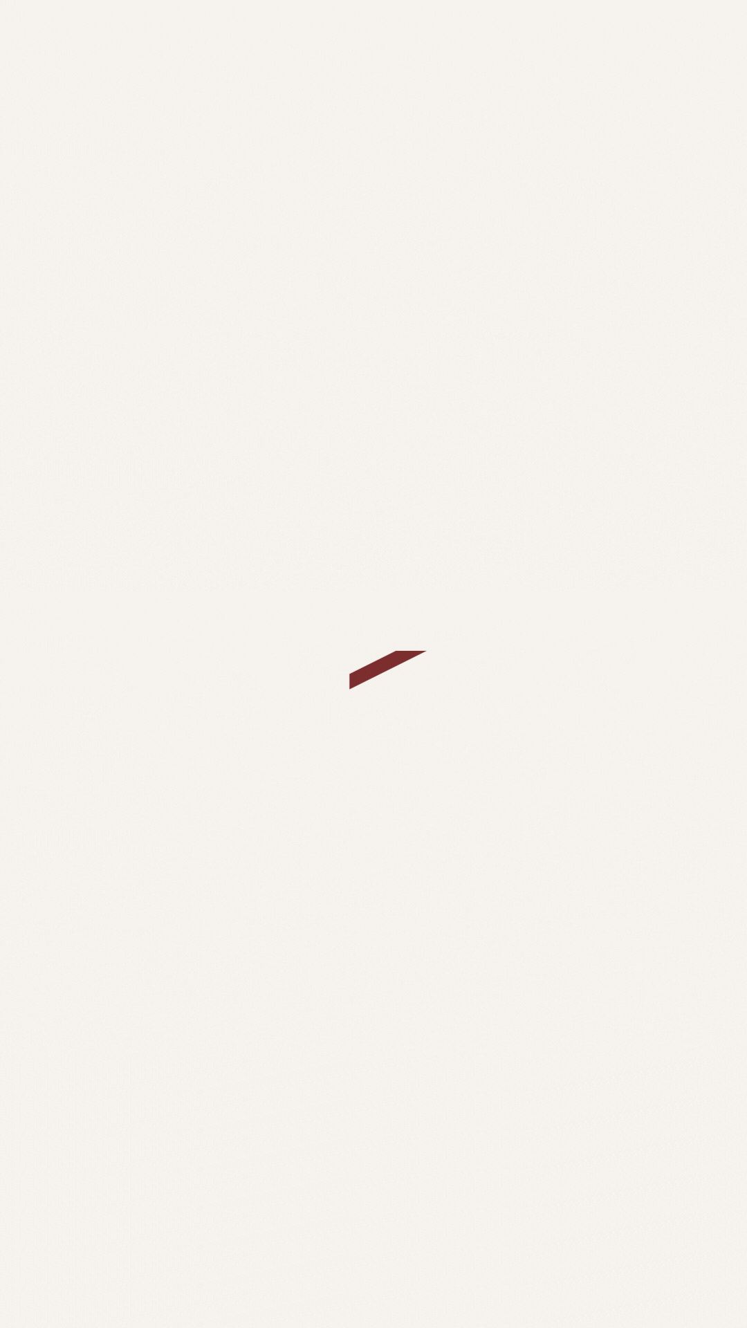 An abstract image with a minimalist design and a diagonal dark red shape in the center.