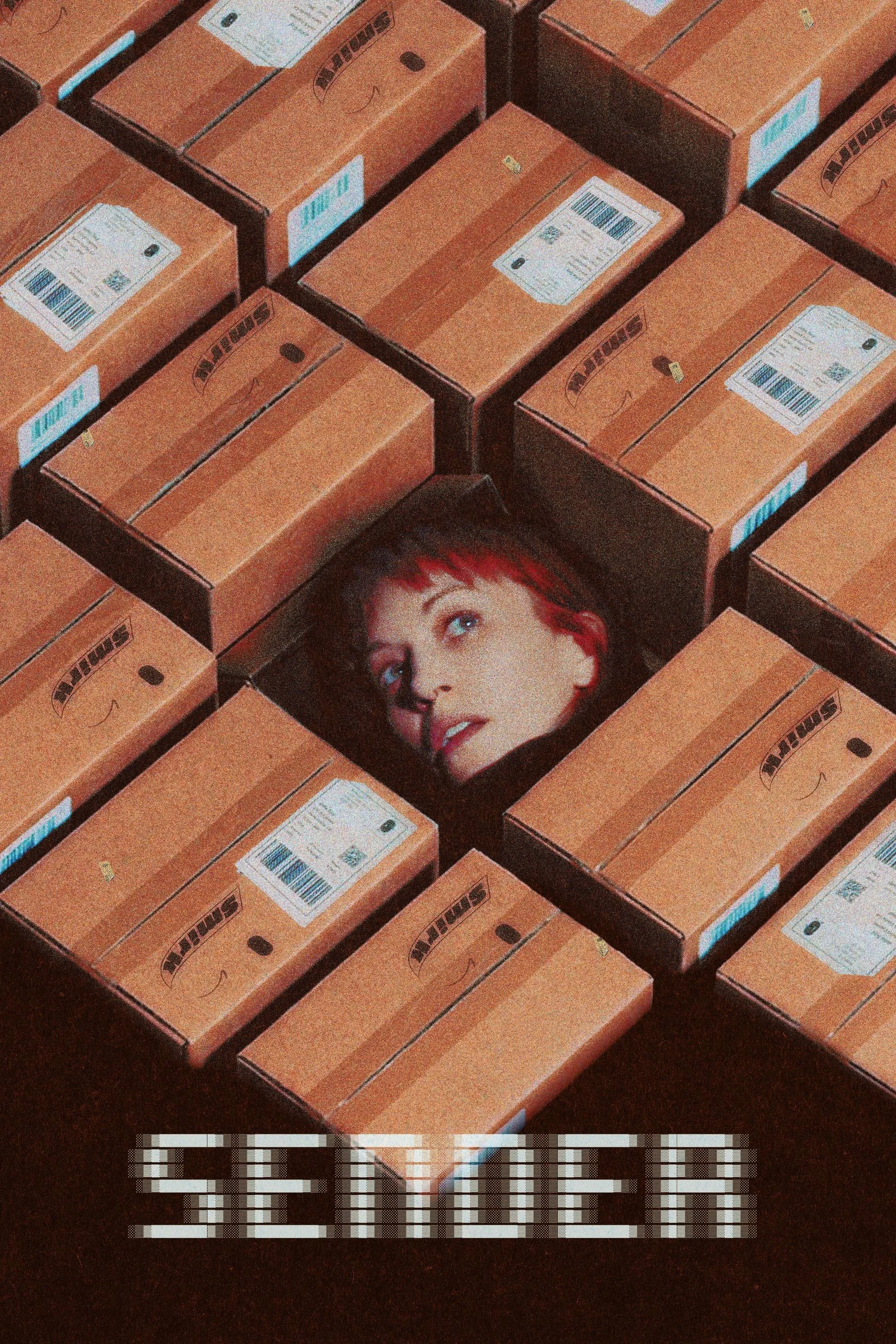 A person's face with red hair is visible through an opening among multiple cardboard boxes, with a timestamp of 3:06 at the bottom of the image.