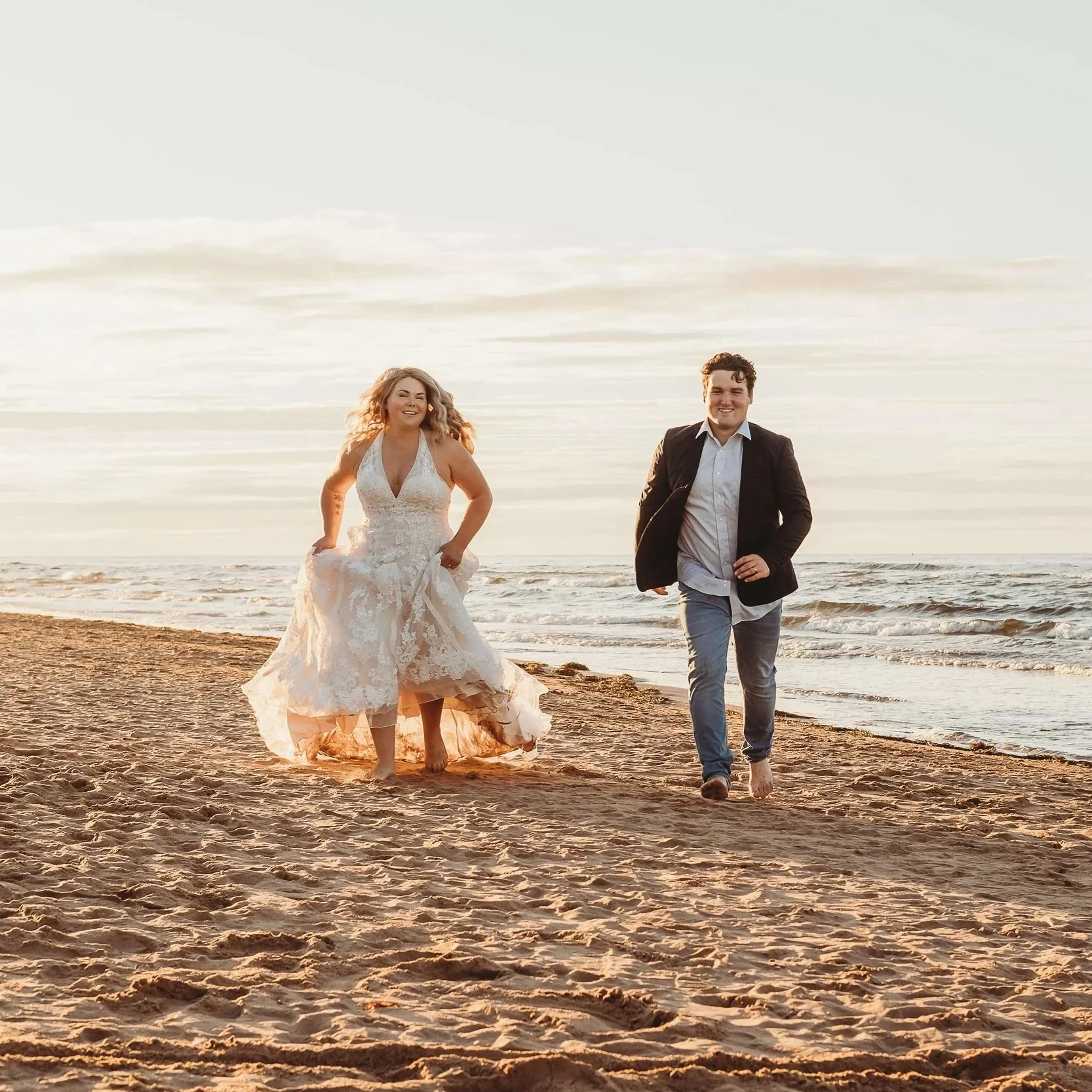 wedding couple running on the beach on sunset in nova scotia, wedding elopement, nova scotia