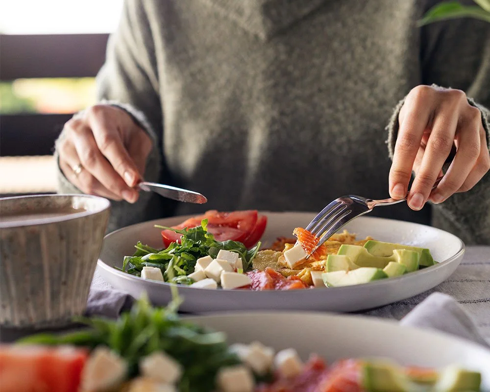 woman eating a nutrient dense meal